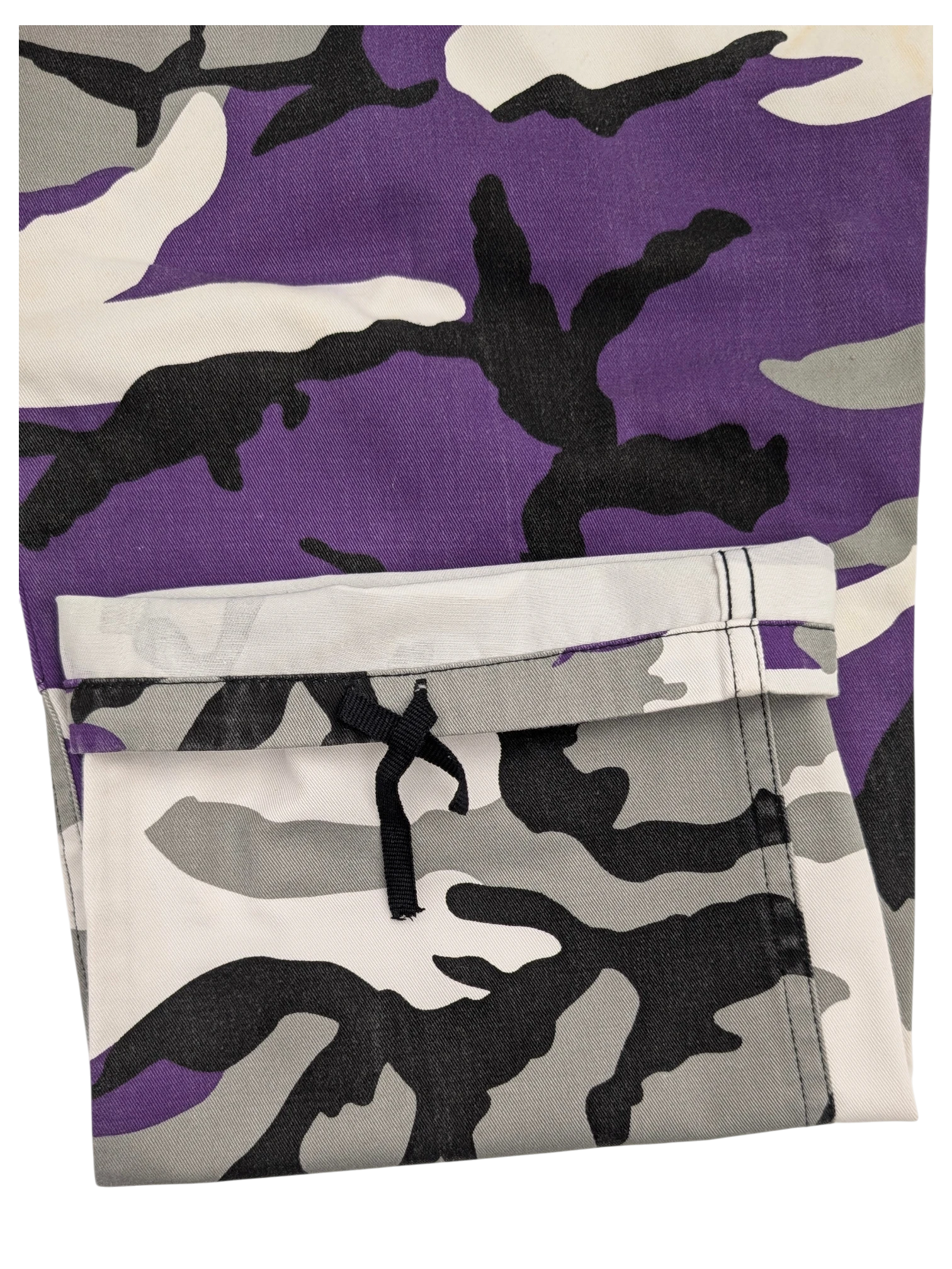 JAKE & IPI purple, white, grey, and black camouflage cargo pants with a drawstring pocket.