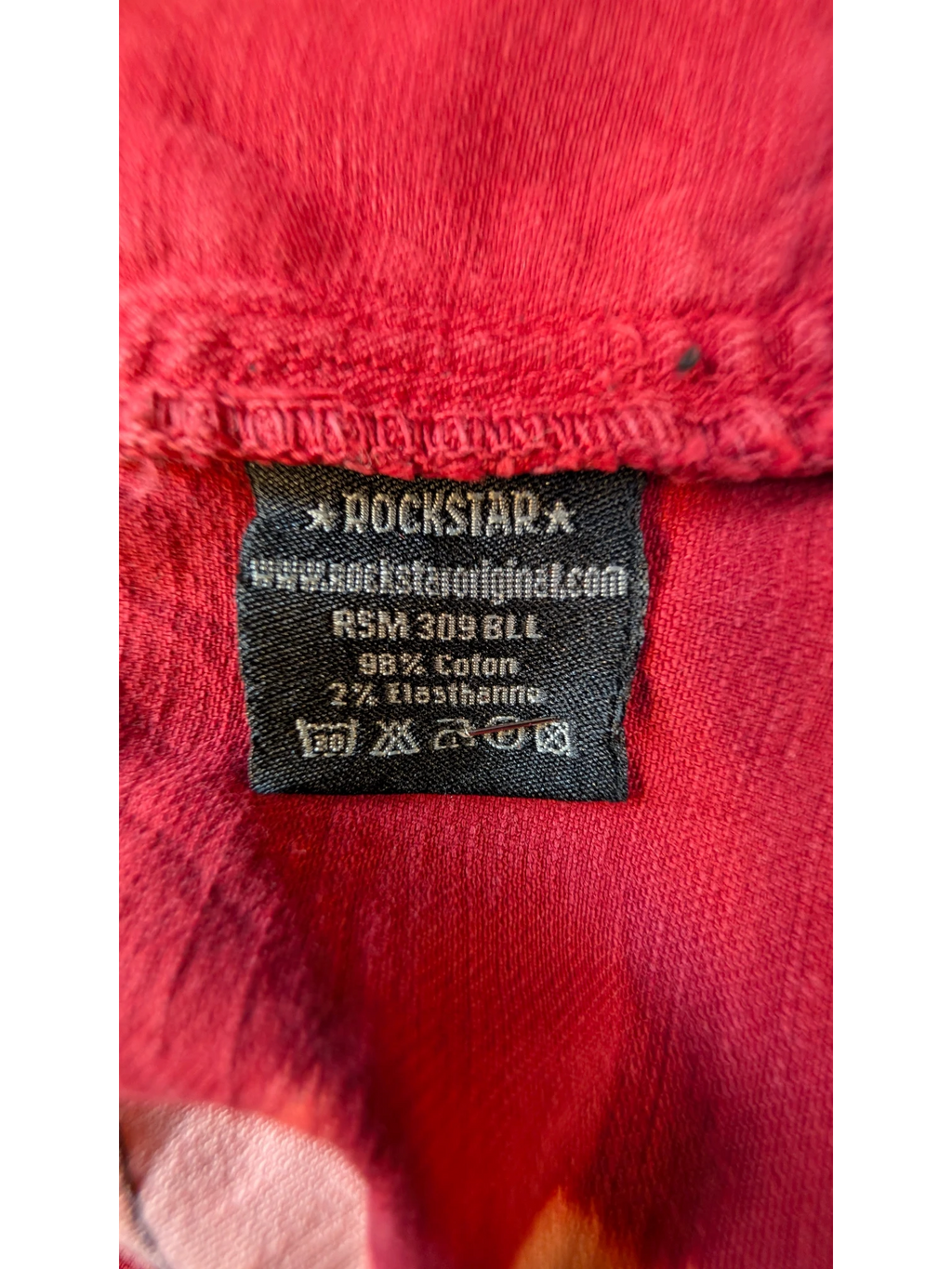 JAKE & IPI Rockstar Original red denim vest, 98% Cotton, 2% Elastane. Features a black label with care instructions.