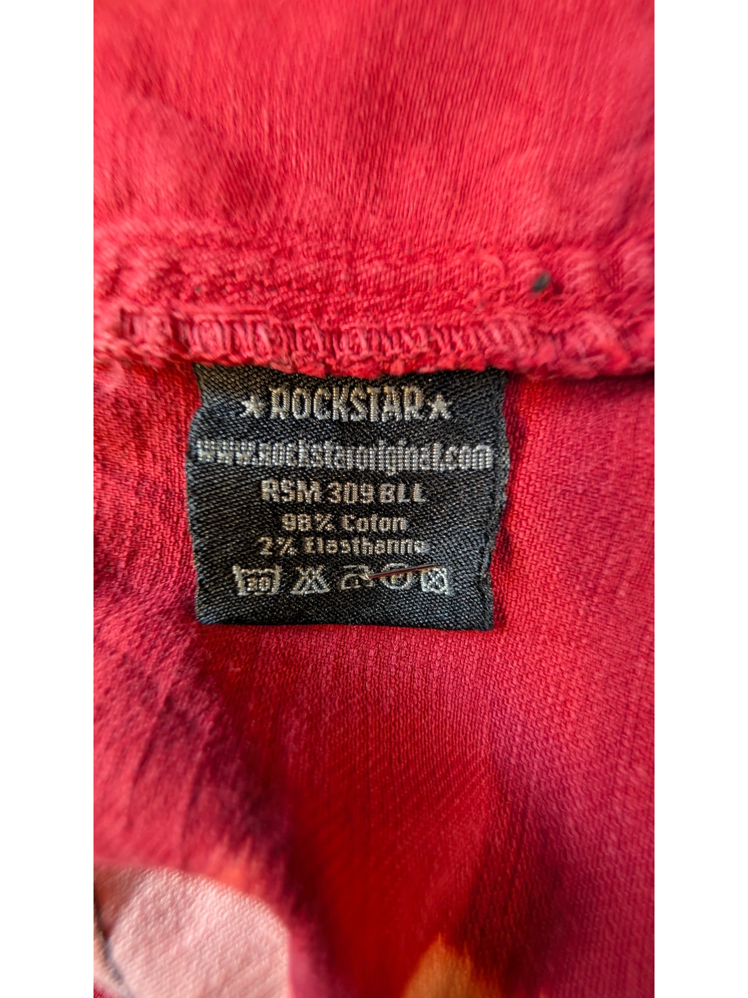 JAKE & IPI Rockstar Original red denim vest, 98% Cotton, 2% Elastane. Features a black label with care instructions.