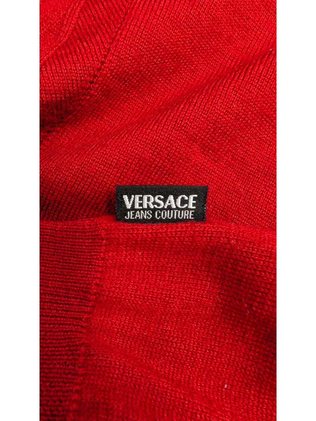 JAKE & IPI Vintage Versace Jeans Couture red wool turtleneck sweater with tonal Medusa logo detail. Made in Italy.