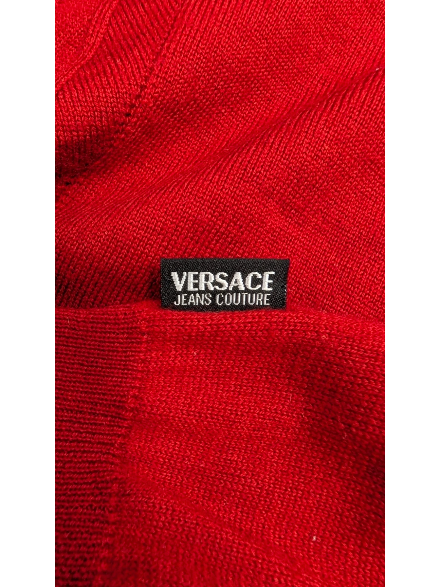 JAKE & IPI Vintage Versace Jeans Couture red wool turtleneck sweater with tonal Medusa logo detail. Made in Italy.
