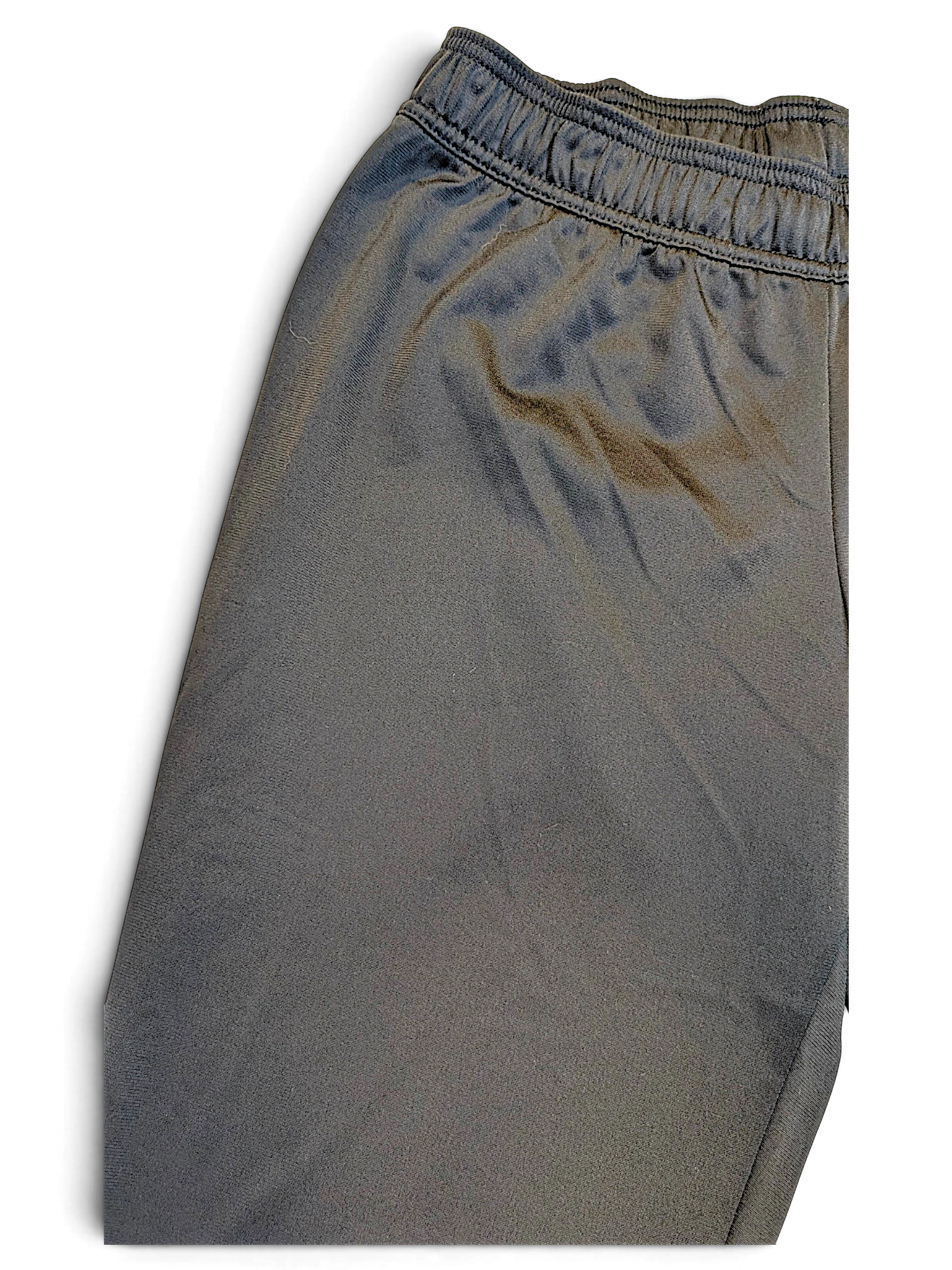 JAKE & IPI pre-owned black Reebok track pants with an elasticated waistband and tapered fit.