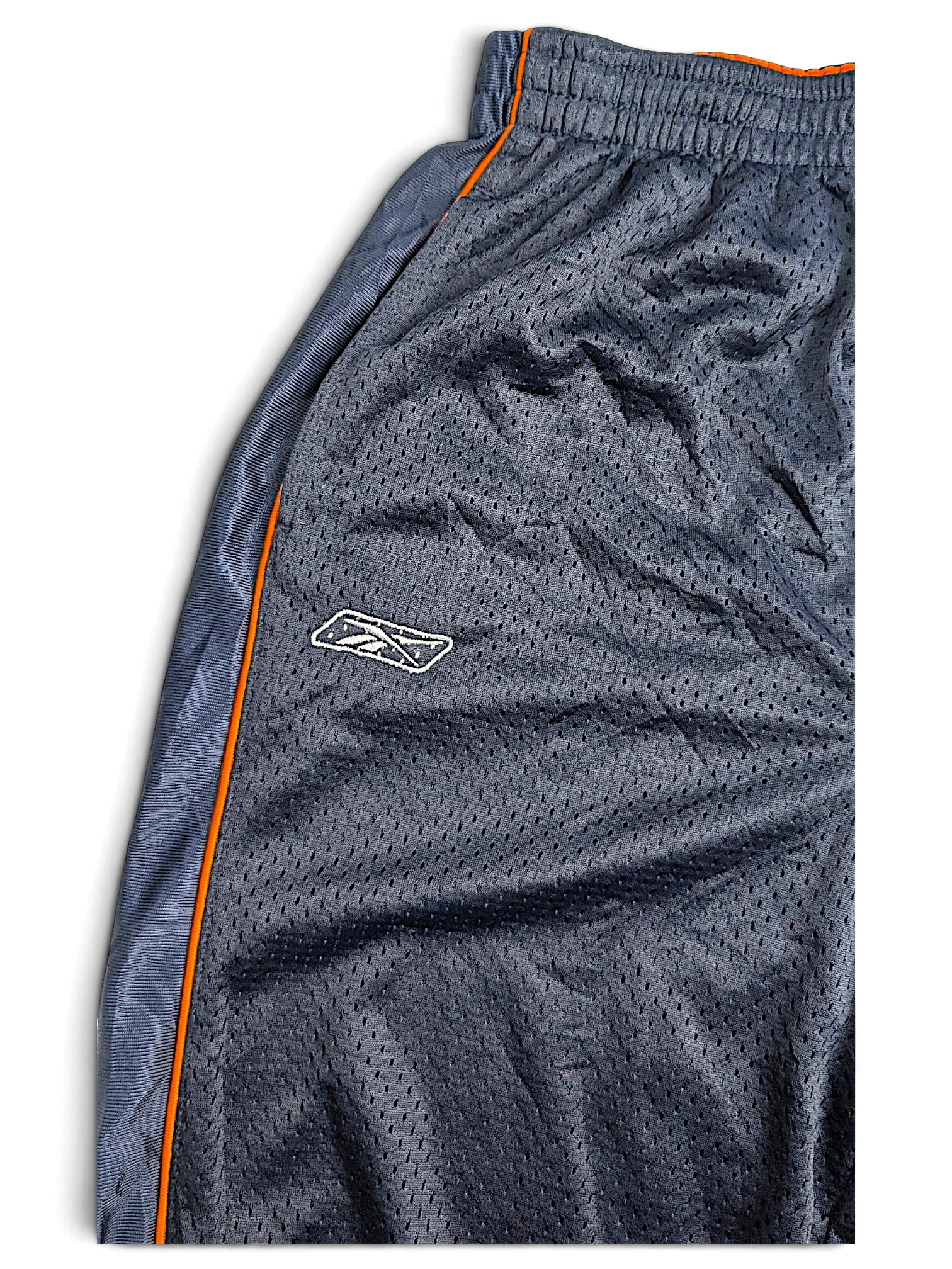 JAKE & IPI navy blue Reebok Chicago Bears youth track pants with orange piping and mesh polyester fabric
