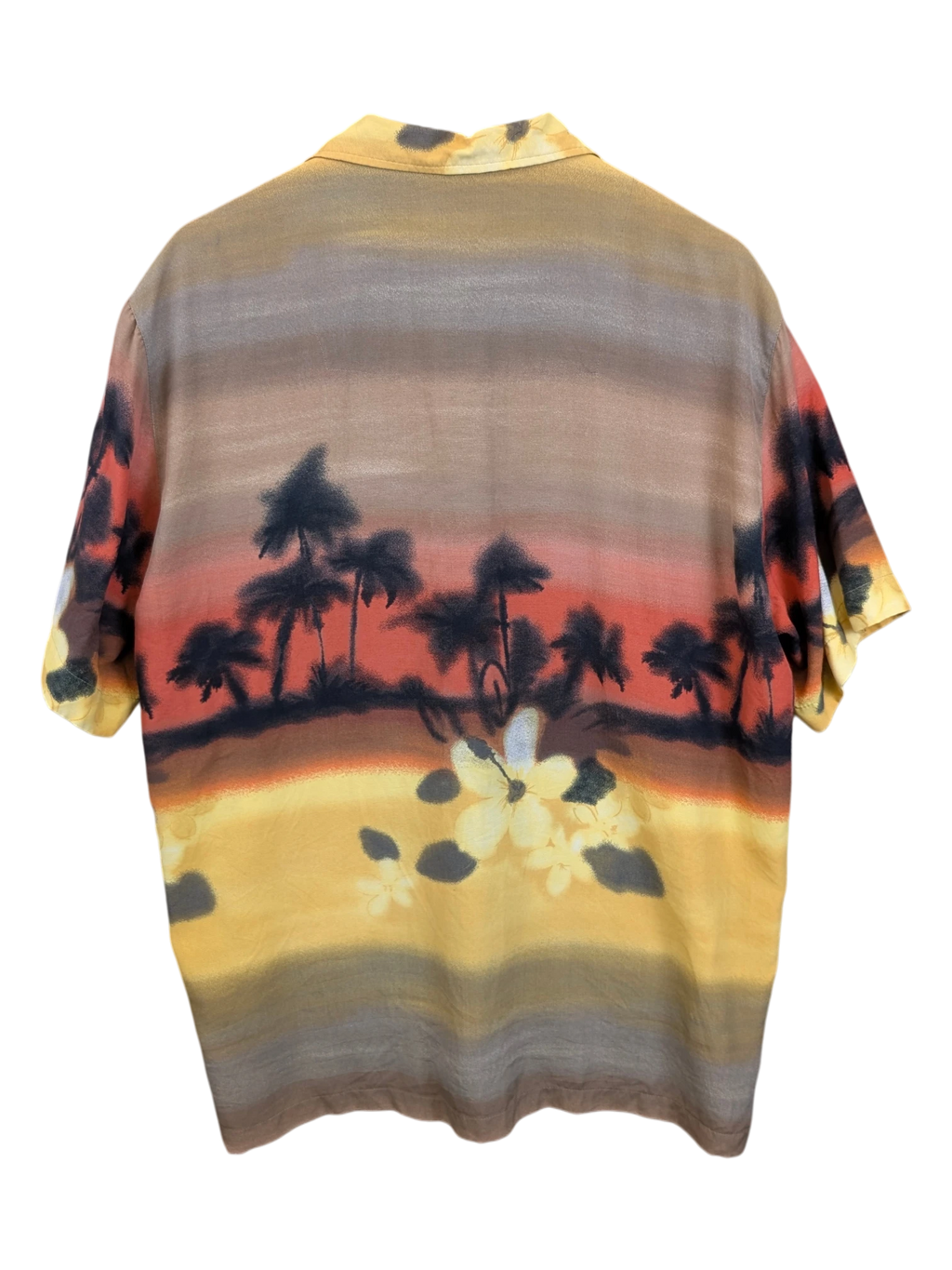 JAKE & IPI Robert Le Cam Hawaiian shirt featuring a sunset tropical palm tree landscape print in yellow and brown.