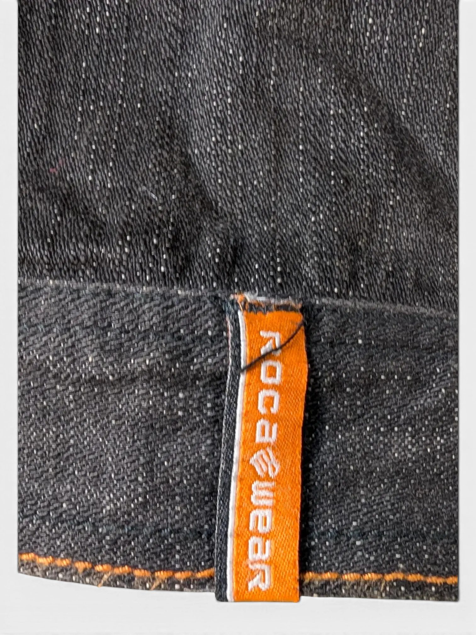 JAKE & IPI dark wash denim jacket with orange Rocawear tag