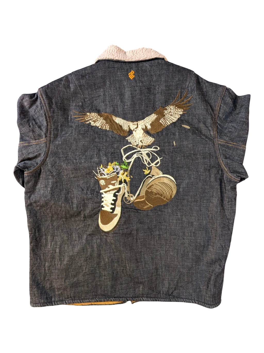 JAKE & IPI Rocawear sherpa denim jacket with embroidered eagle and sneakers graphic. Dark wash denim with cream sherpa collar.