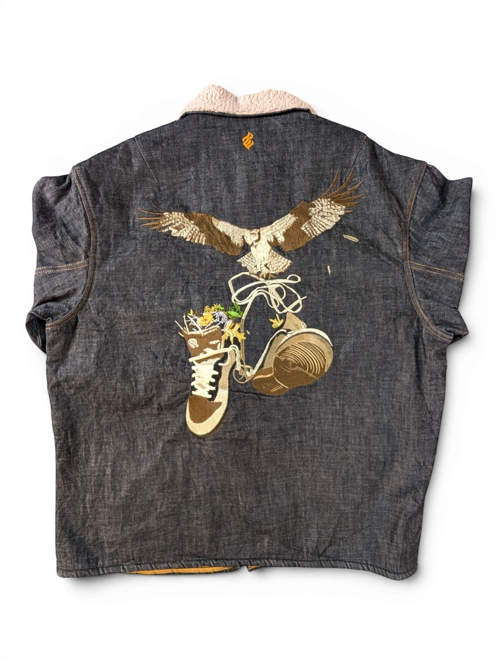 JAKE & IPI Rocawear sherpa denim jacket with embroidered eagle and sneakers graphic. Dark wash denim with cream sherpa collar.