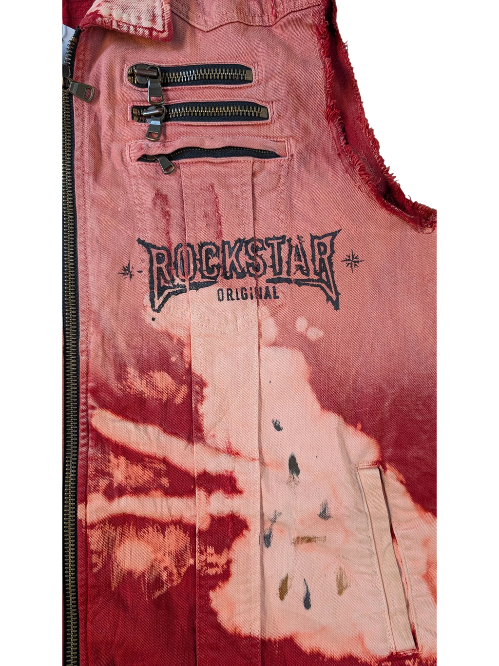 JAKE & IPI Rockstar Original denim vest in red with bleached effect and distressed details. Features zip pockets and raw hem.