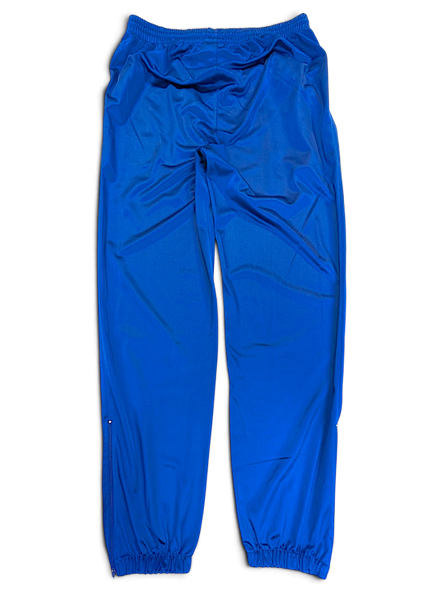 JAKE & IPI pre-owned Rucanor royal blue track pants with elastic waist and retro sportswear styling.