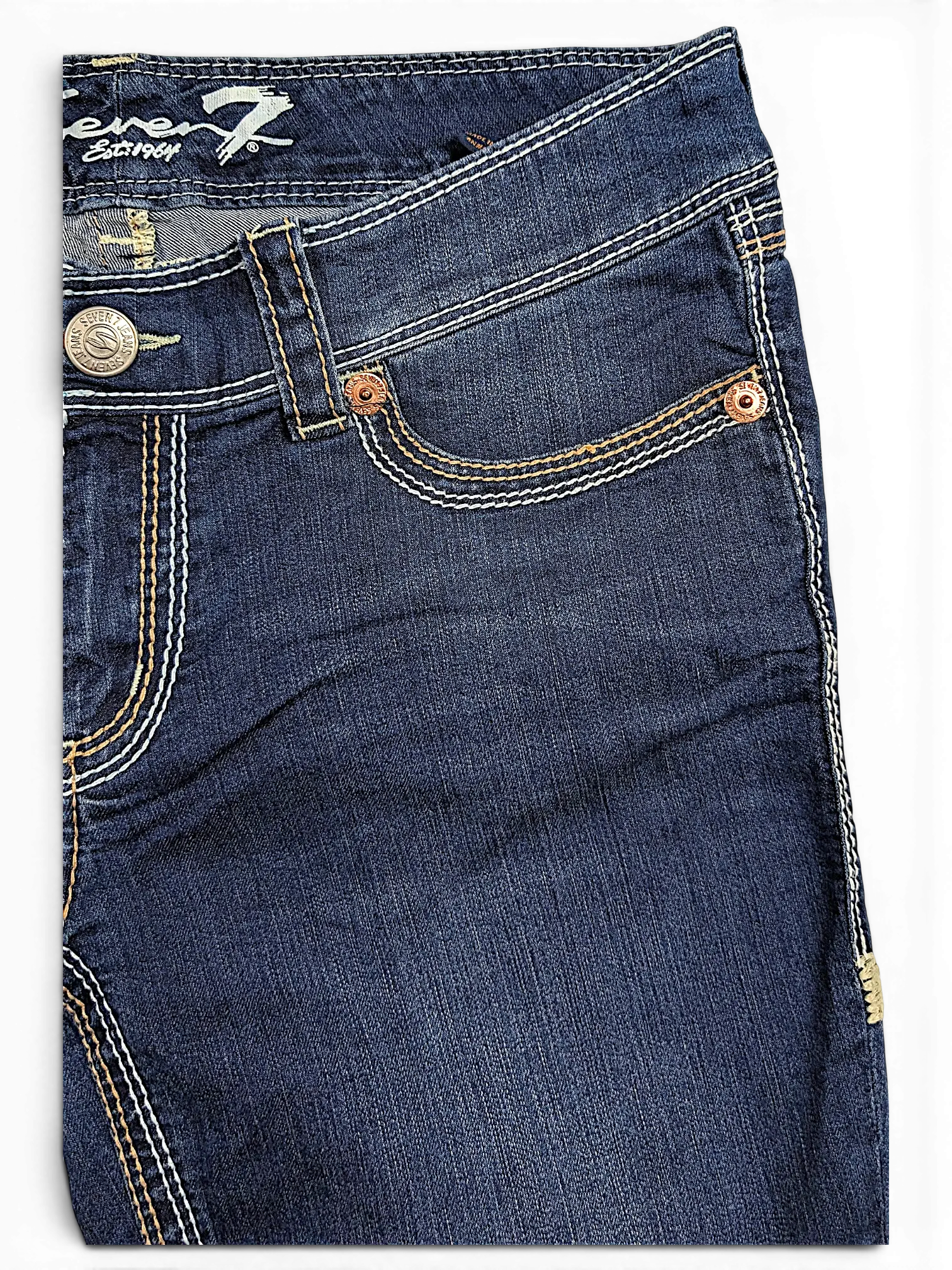 JAKE & IPI Seven7 dark wash denim capri jeans featuring contrast stitching, copper rivets, and a button closure.