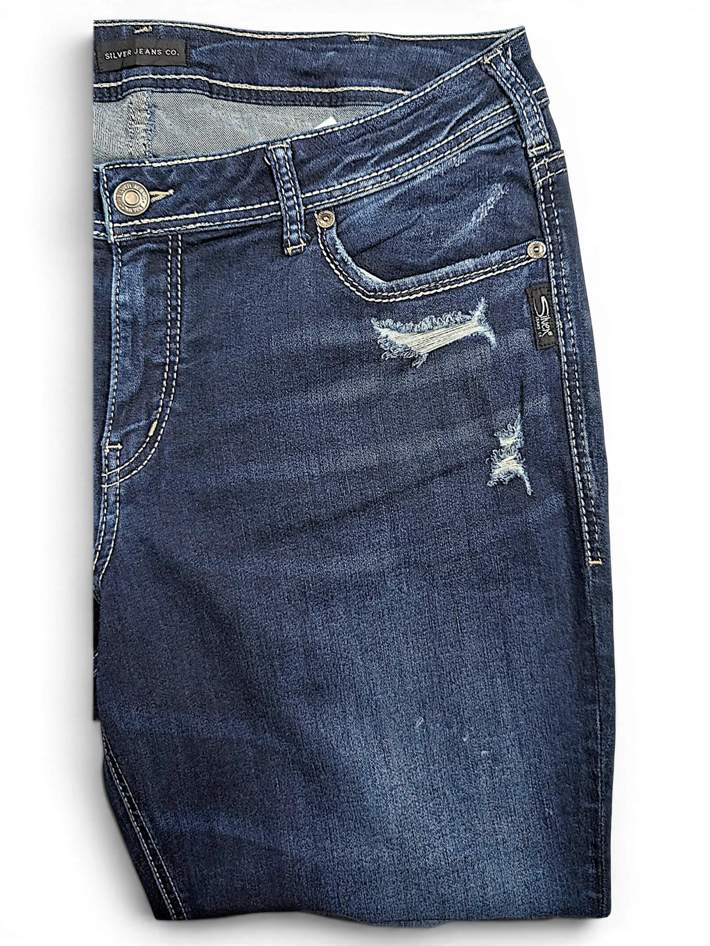 JAKE & IPI Silver Jeans Co. Suki Capri in dark wash denim with distressed details and contrast stitching