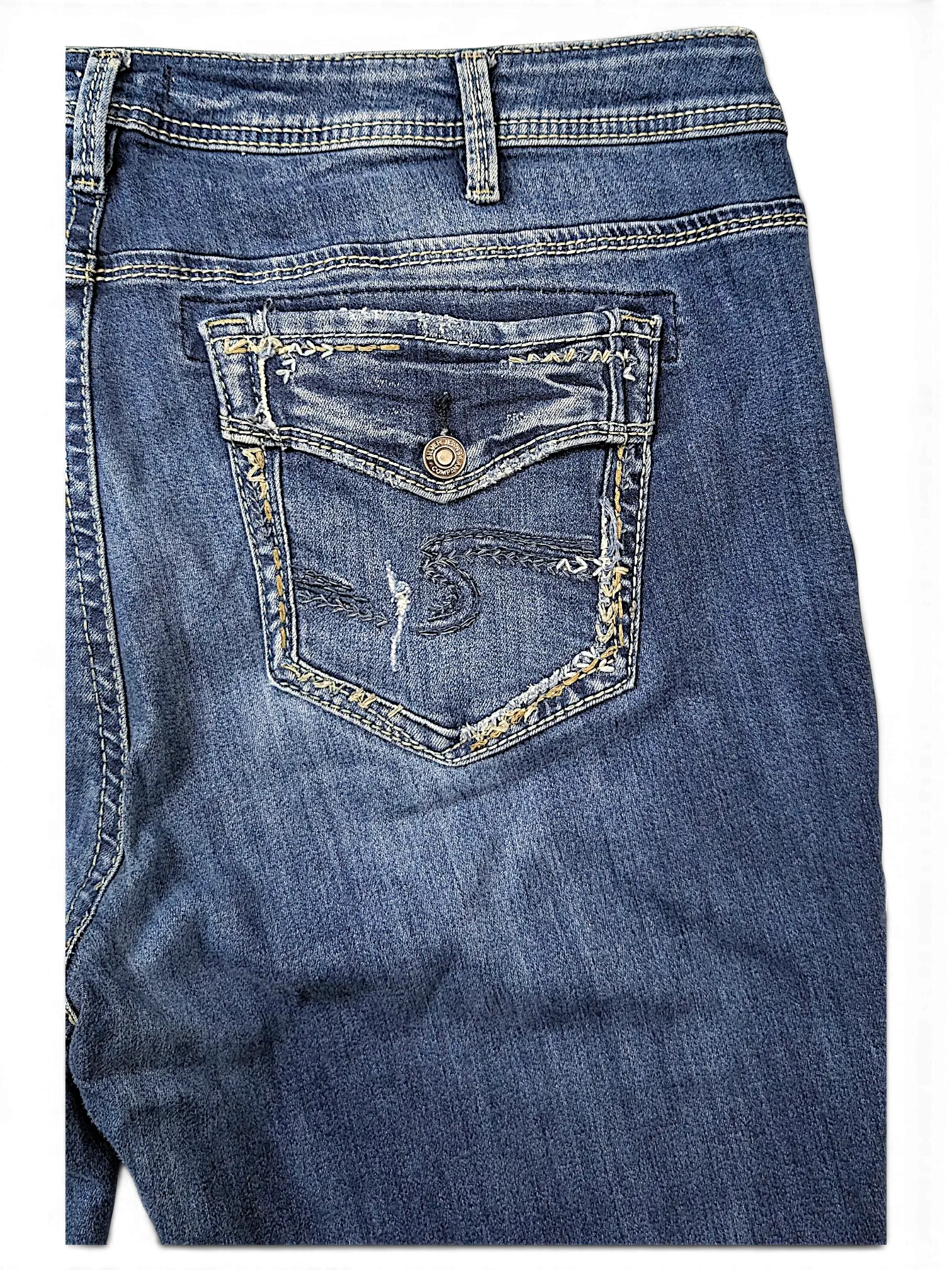 JAKE & IPI Silver Jeans Co. Elyse slim boot jeans featuring a medium wash denim with detailed back pocket stitching.