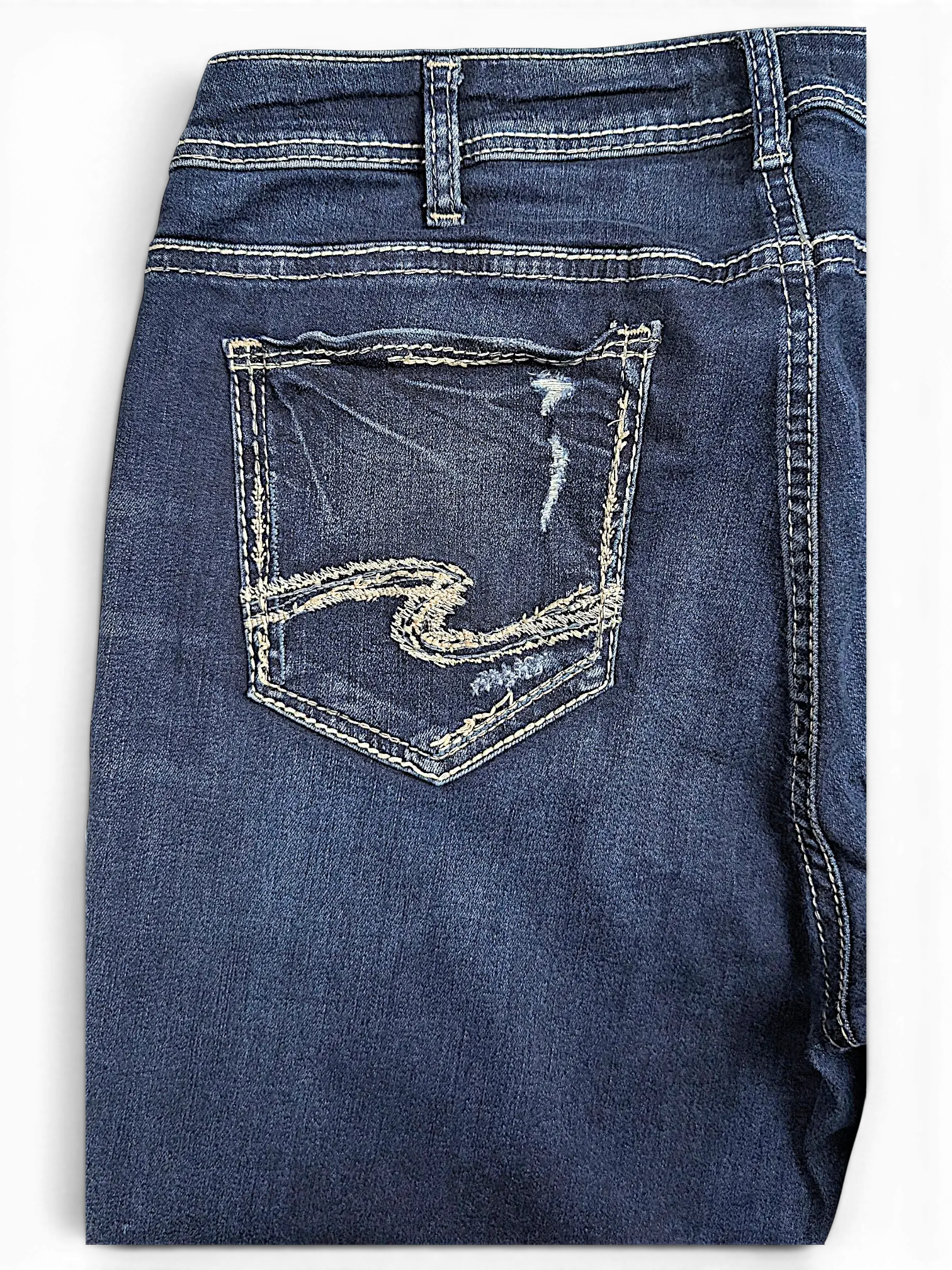 JAKE & IPI Silver Jeans Co. Suki Capri dark wash denim with distressed back pocket and signature embroidery