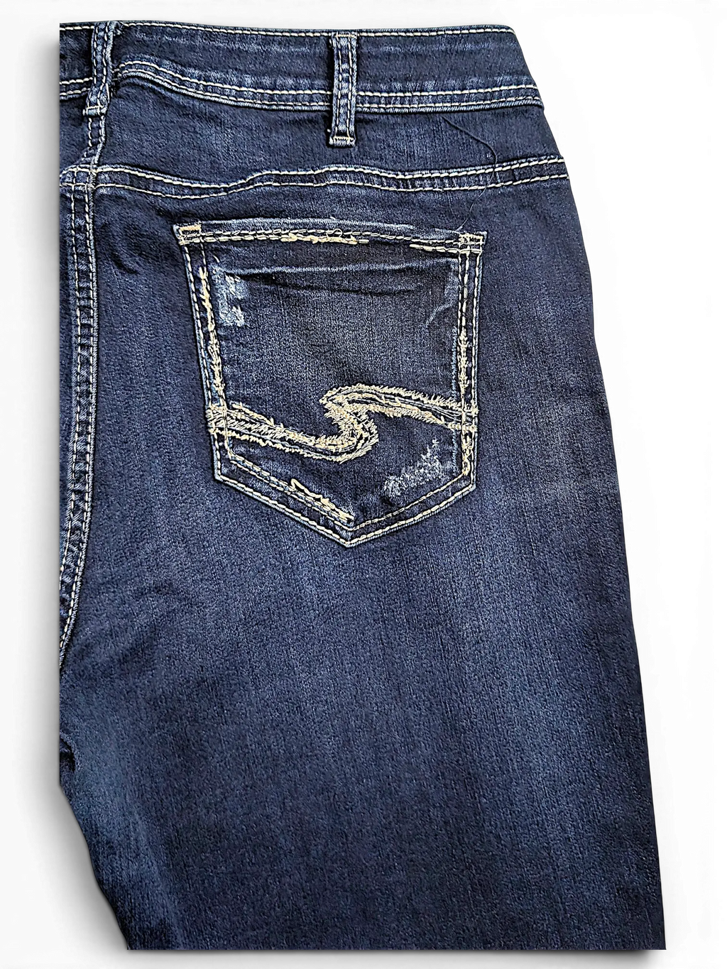 JAKE & IPI Silver Jeans Co. Suki Capri dark wash denim with signature back pocket embroidery and distressed detailing