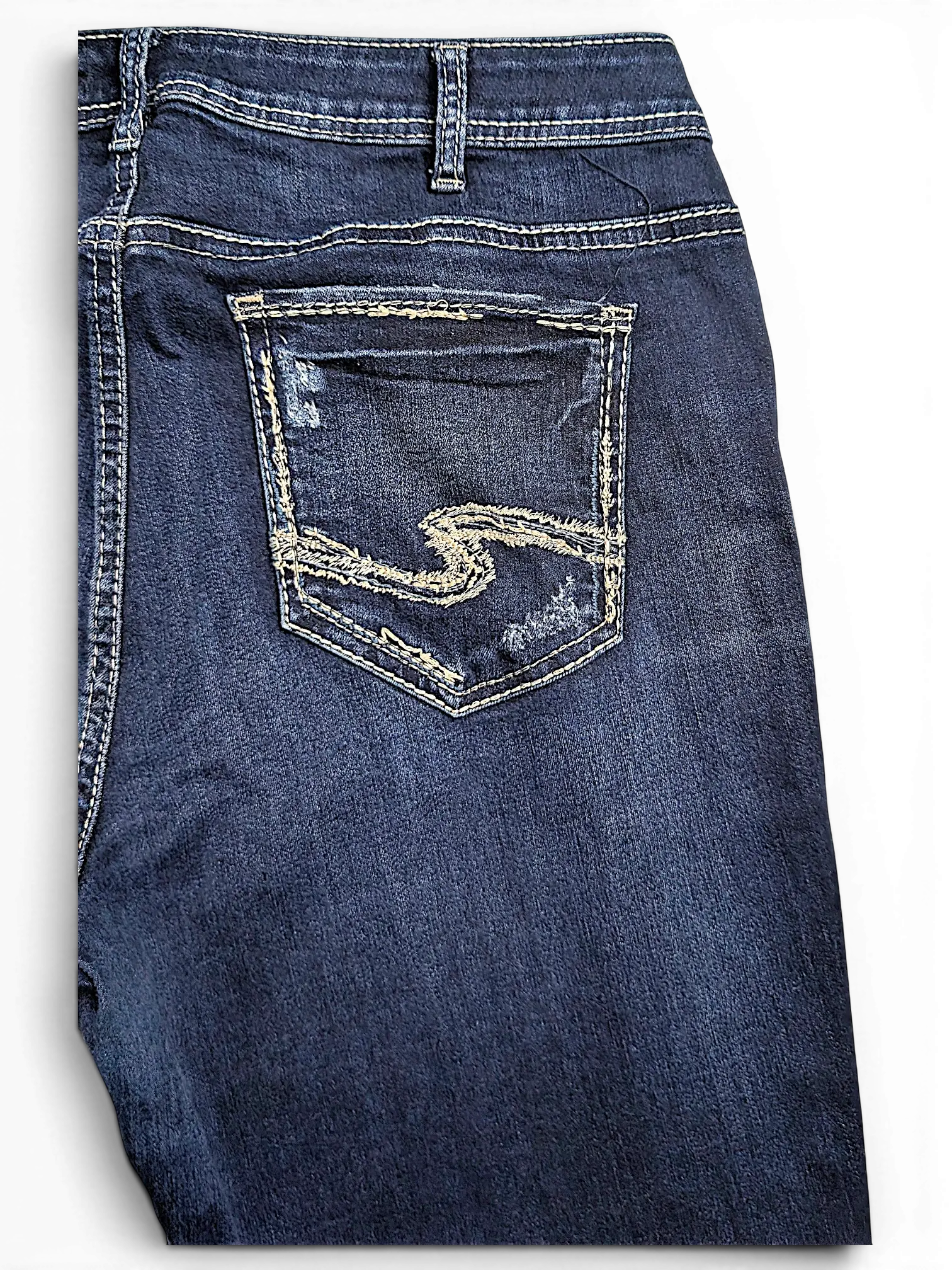 JAKE & IPI Silver Jeans Co. Suki Capri dark wash denim with signature back pocket embroidery and distressed detailing