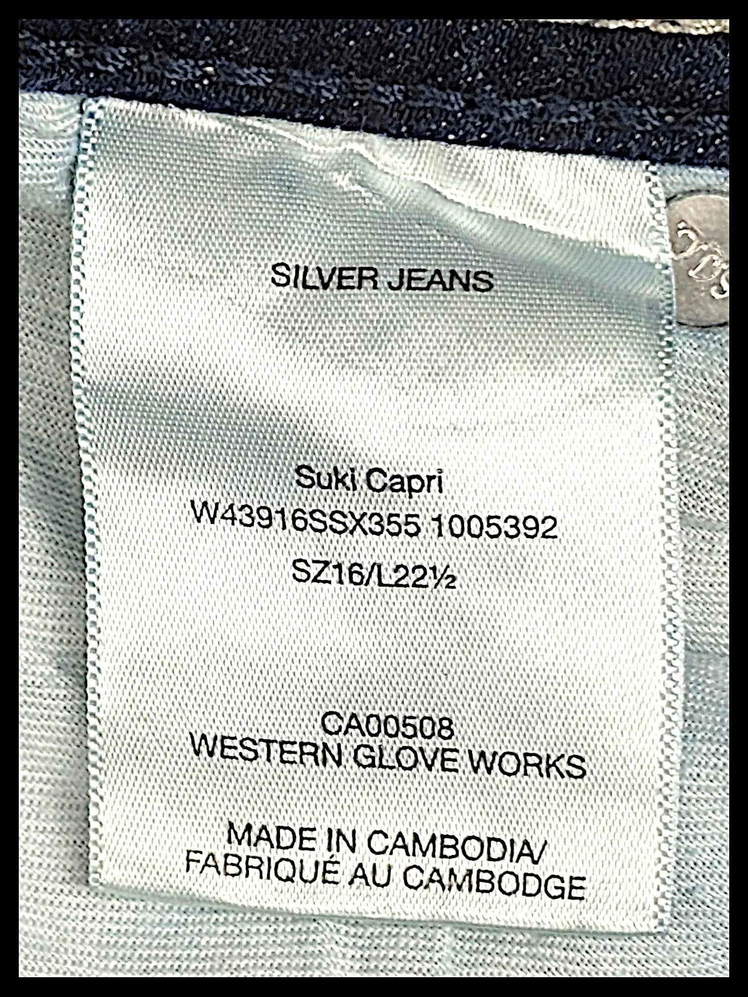 JAKE & IPI Silver Jeans Co. Suki Capri size 16 L22.5 garment care label inside dark blue denim jeans