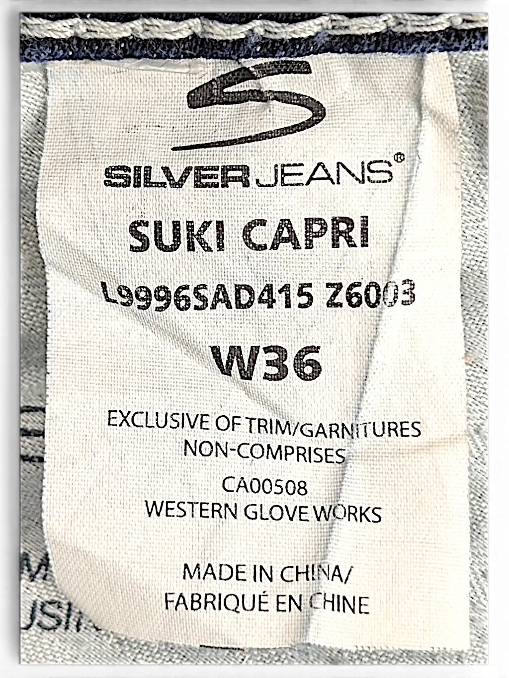 JAKE & IPI Silver Jeans Suki Capri size W36 clothing label with product details and care information