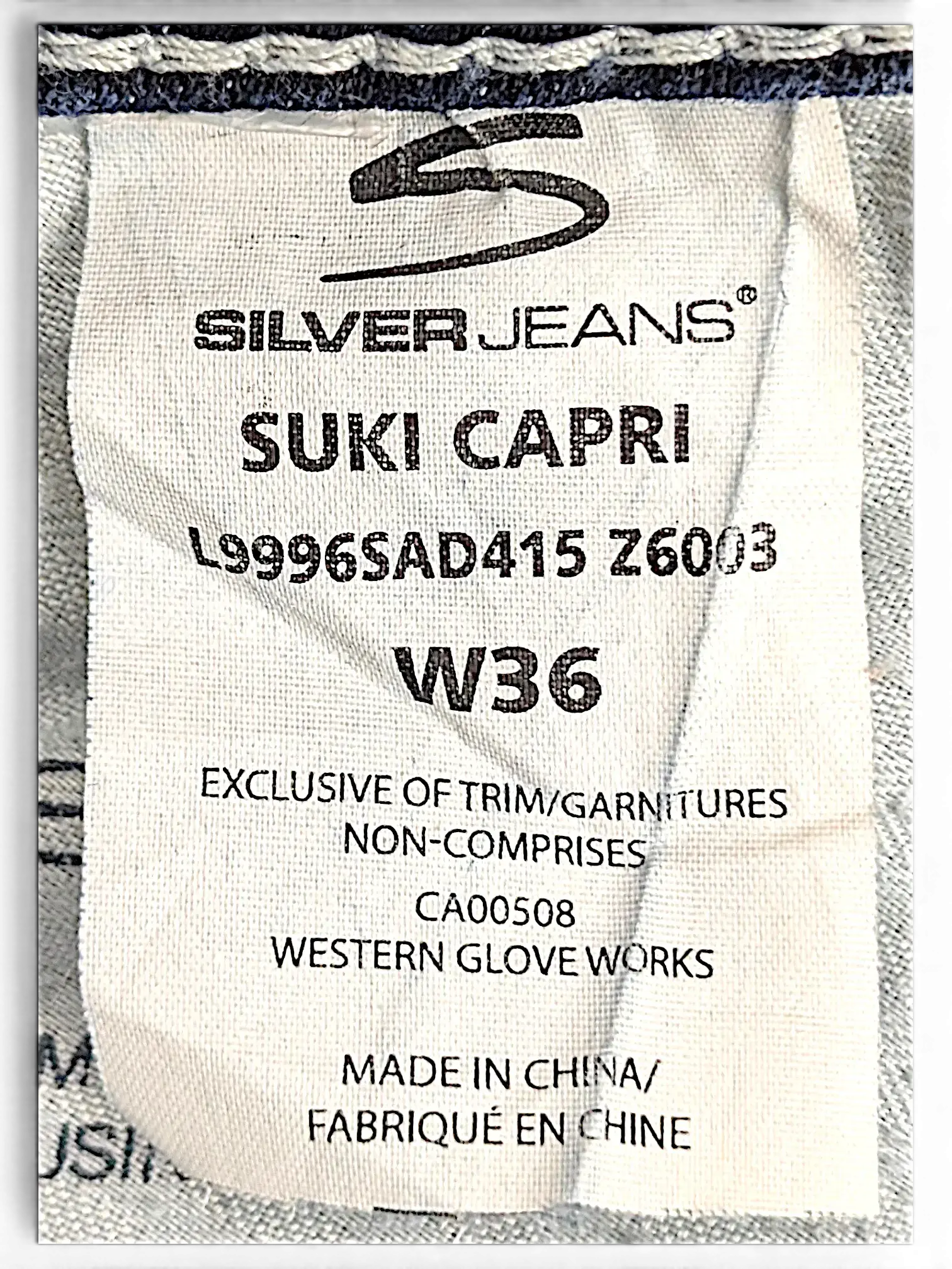 JAKE & IPI Silver Jeans Suki Capri size W36 clothing label with product details and care information