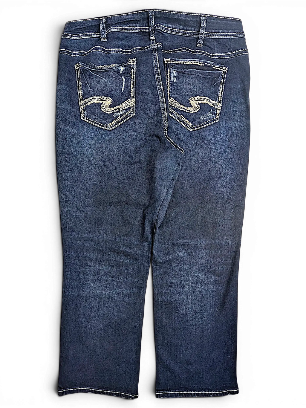 JAKE & IPI Silver Jeans Co. Suki dark wash denim capri pants with signature back pocket embroidery and distressed detail