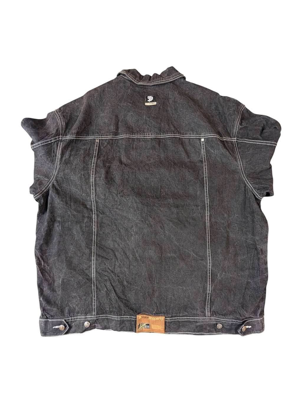 JAKE & IPI State Property dark wash denim jacket with white contrast stitching and a distressed look.