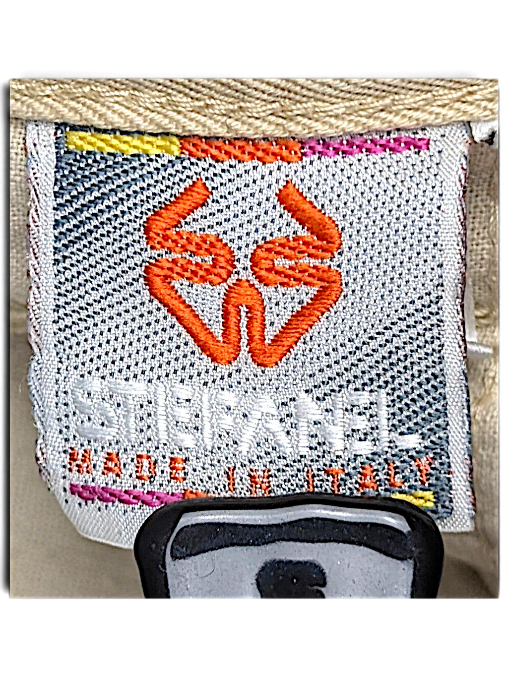 JAKE & IPI Stefanel brand label stitched inside beige Italian cotton trousers with orange logo embroidery