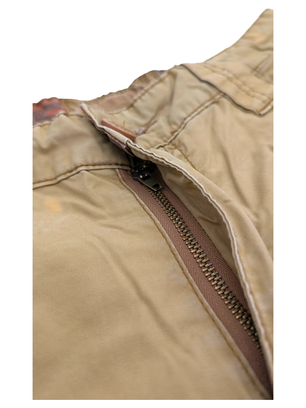 JAKE & IPI tan cotton cargo pants with a metal zipper and leather tab detail.