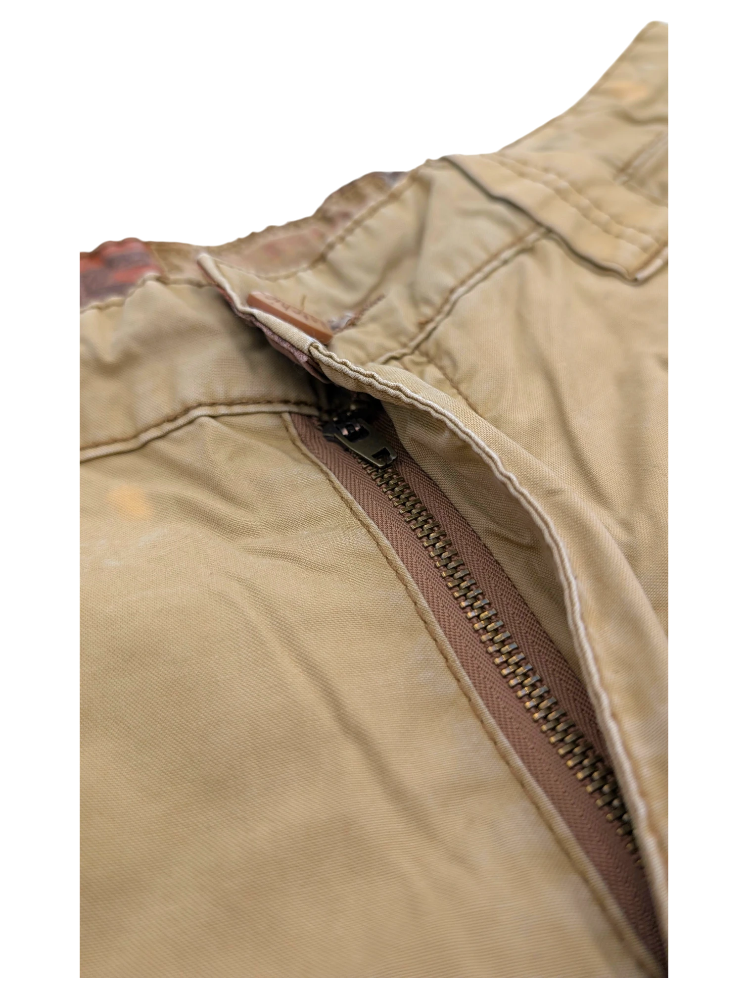 JAKE & IPI tan cotton cargo pants with a metal zipper and leather tab detail.