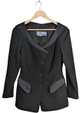 JAKE & IPI vintage Thierry Mugler Paris black structured jacket with satin collar and asymmetrical closure. Made in France.