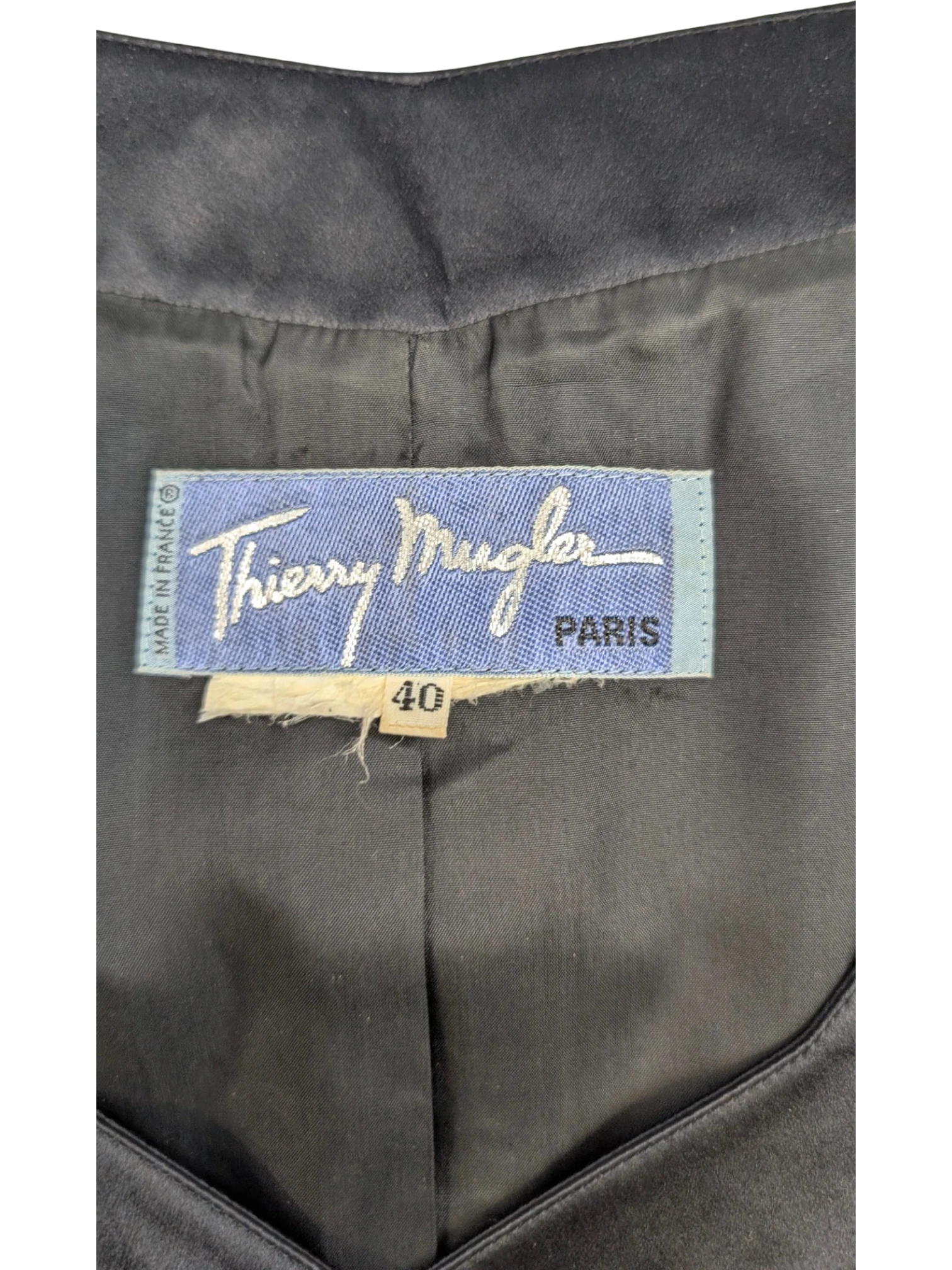 JAKE & IPI vintage Thierry Mugler Paris black structured jacket, size 40, made in France, with satin collar detail.