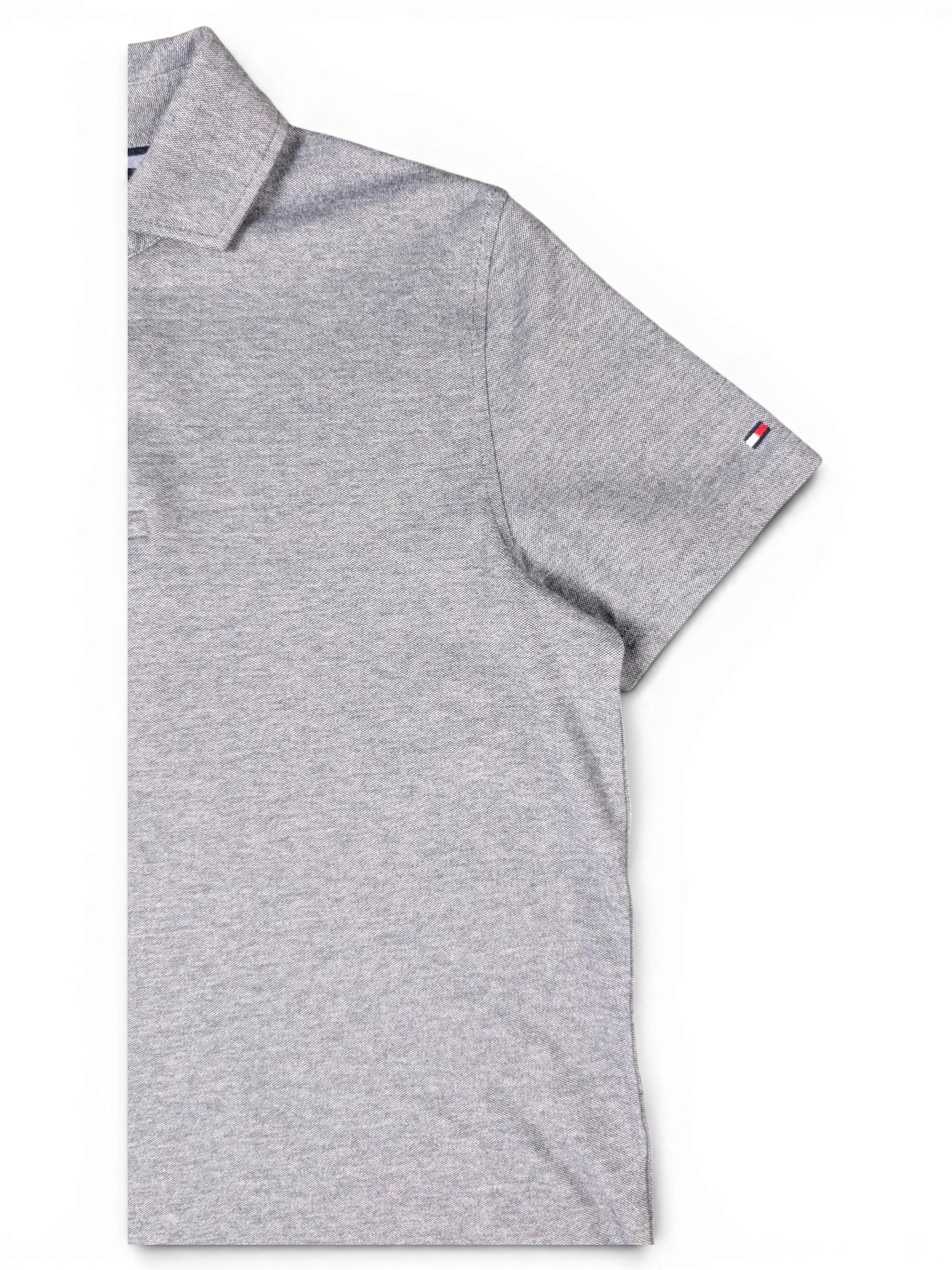 JAKE & IPI pre-owned Tommy Hilfiger grey short-sleeve polo shirt with a classic collar and small logo detail.