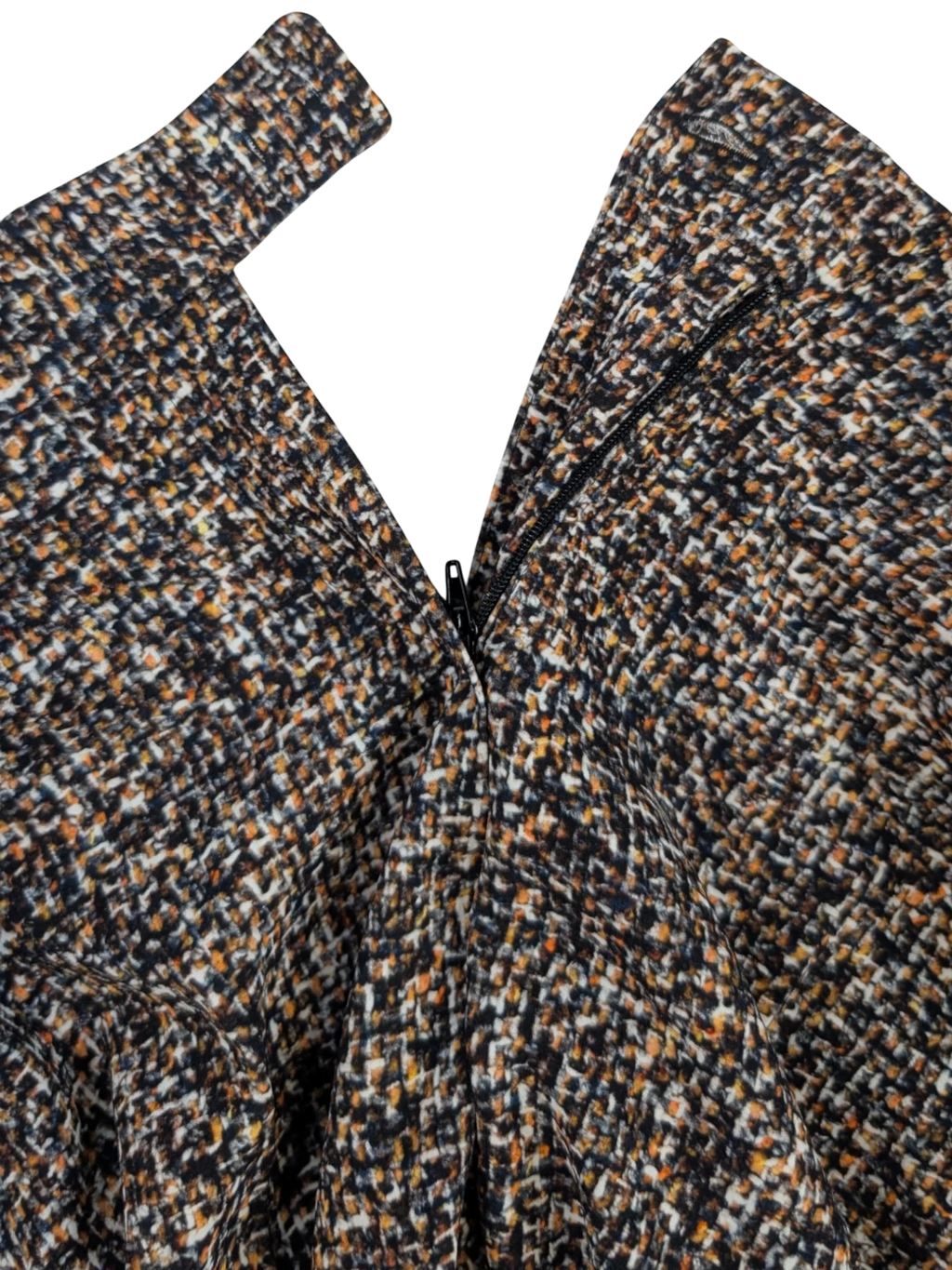 JAKE & IPI slim tailored trousers in tweed-effect fabric with black, beige, and brown tones. Concealed zip closure.