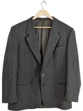 JAKE & IPI Vintage Valentino Uomo grey wool blazer with notched lapel and two-button closure. Made in Italy.