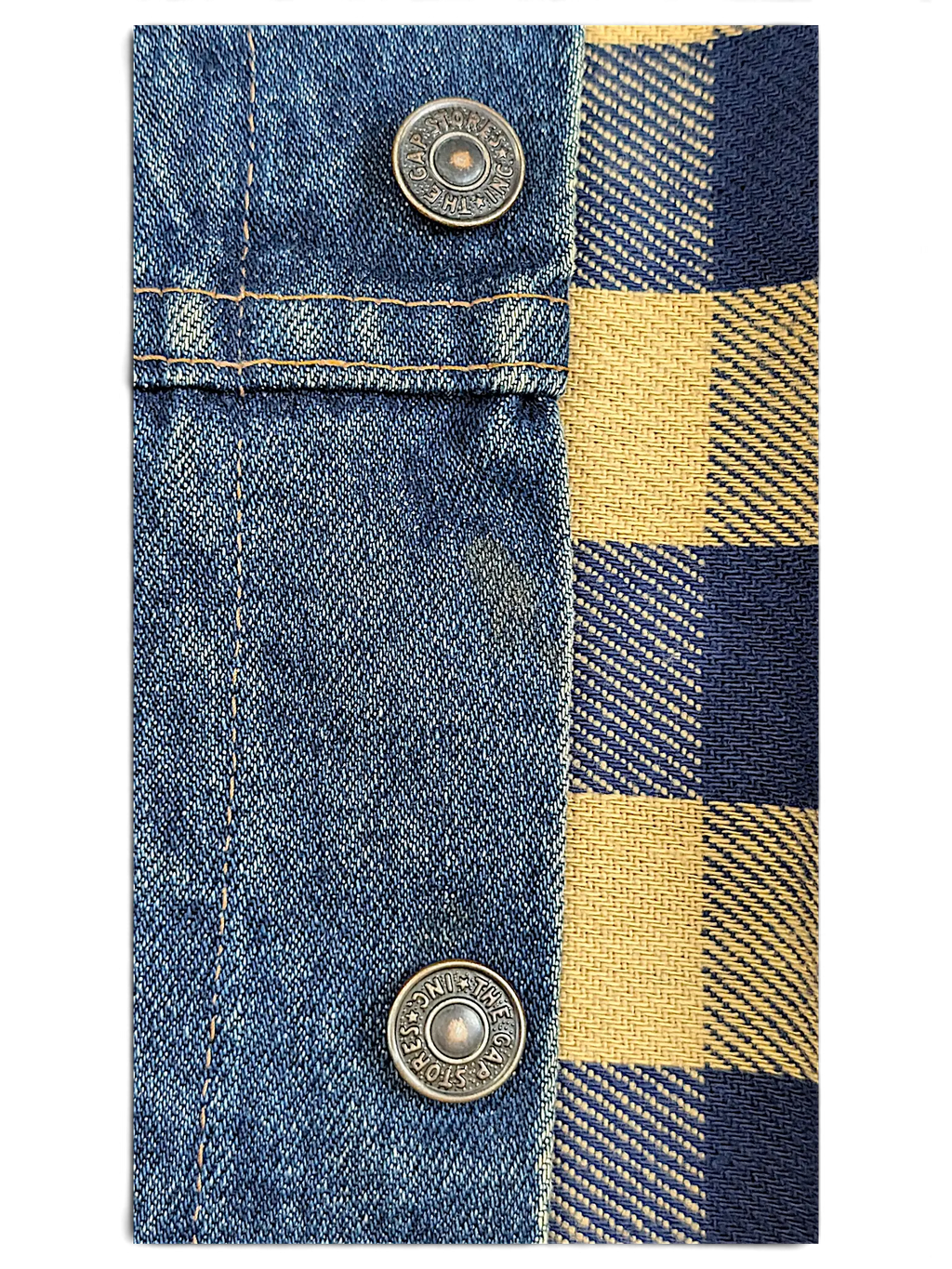 JAKE & IPI vintage denim jacket detail showing metal buttons and blue and tan plaid lining