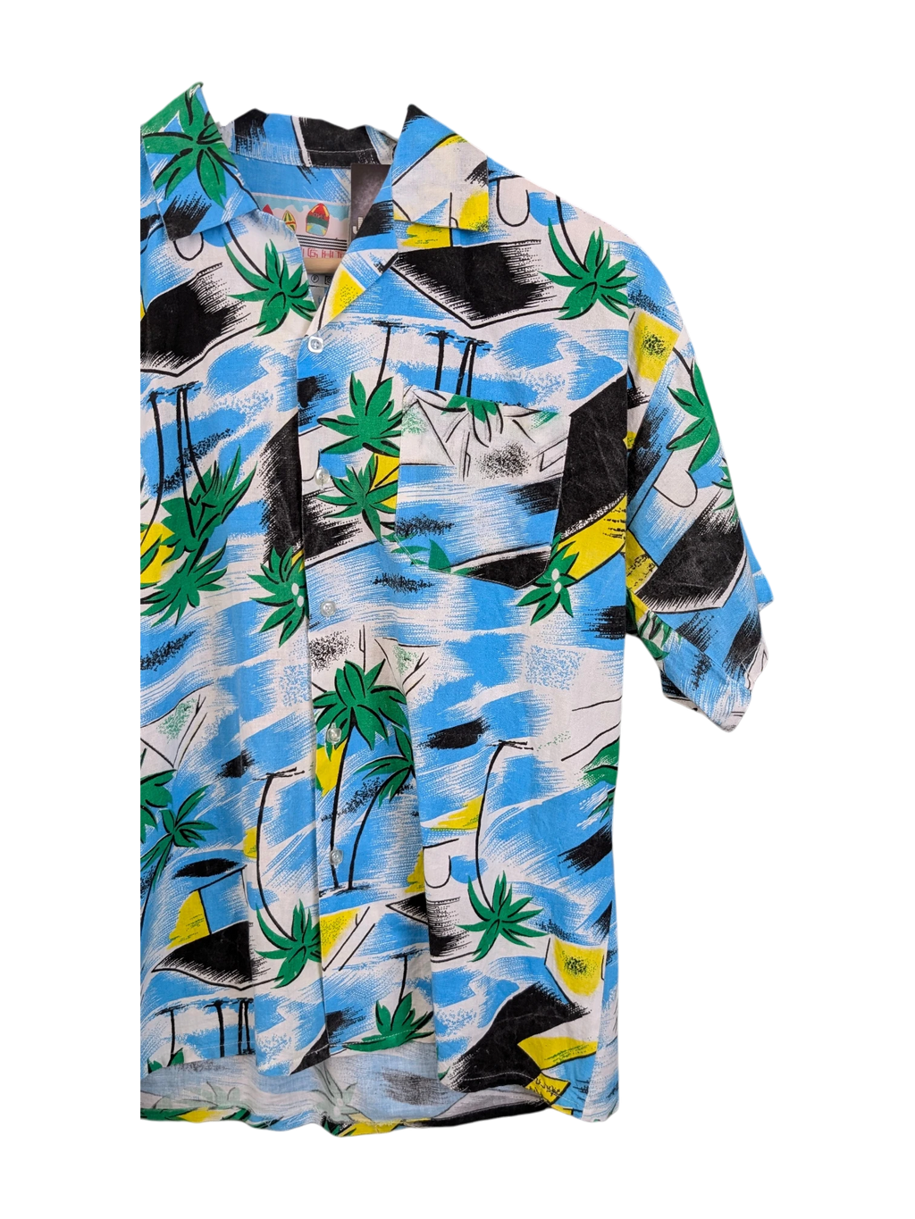 JAKE & IPI vintage 90s Hawaiian shirt featuring a blue, green, and yellow tropical palm tree print on a button-down