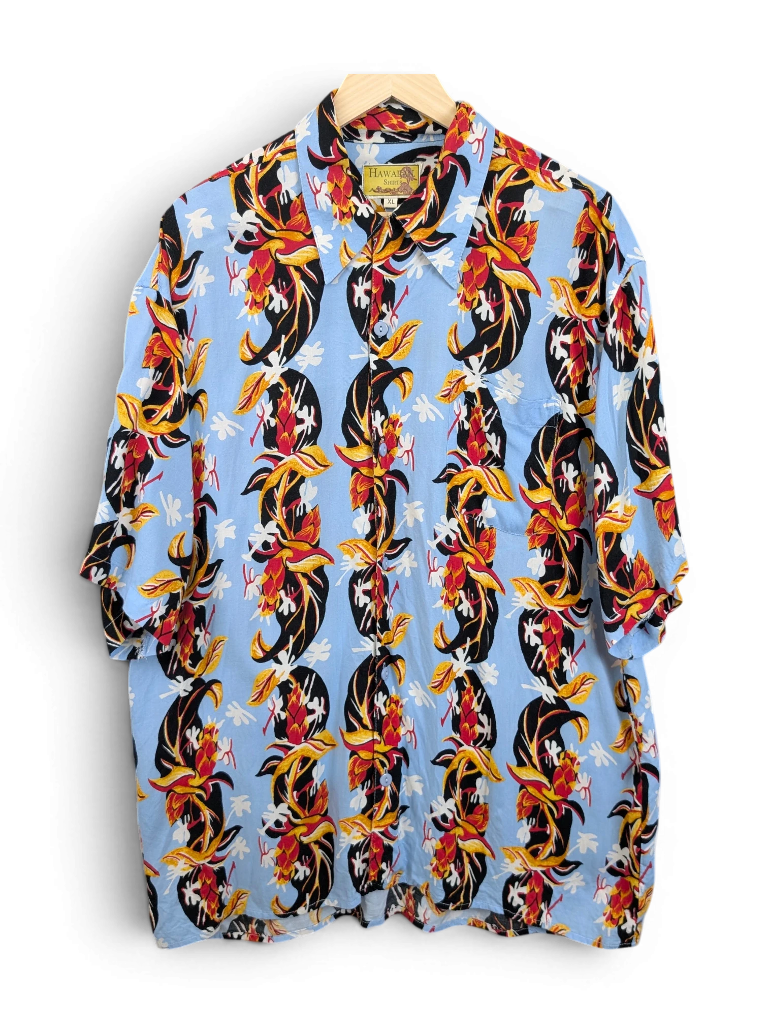 JAKE & IPI vintage 90s light blue Hawaiian aloha shirt with vibrant red and black tropical floral print