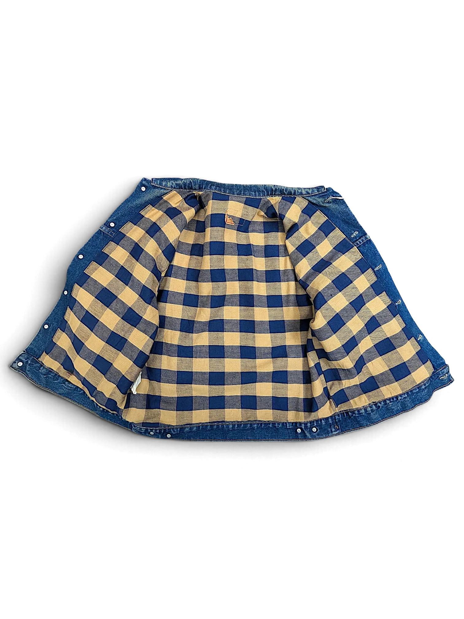 JAKE & IPI vintage Levi's denim jacket featuring a blue and tan plaid flannel lining, shown from the inside.