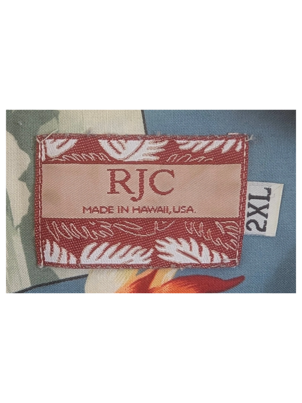 JAKE & IPI vintage RJC Hawaiian shirt label with blue floral and car print fabric in size 2XL
