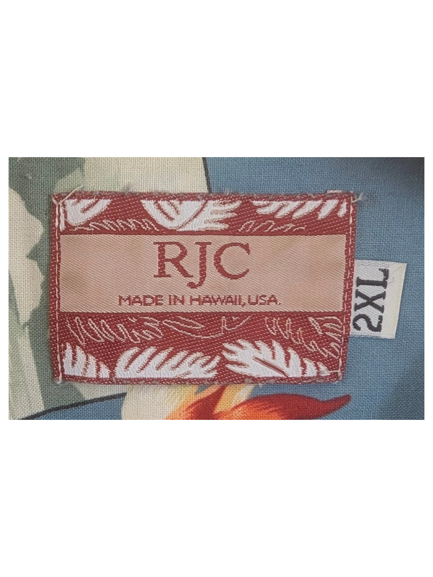 JAKE & IPI vintage RJC Hawaiian shirt label with blue floral and car print fabric in size 2XL