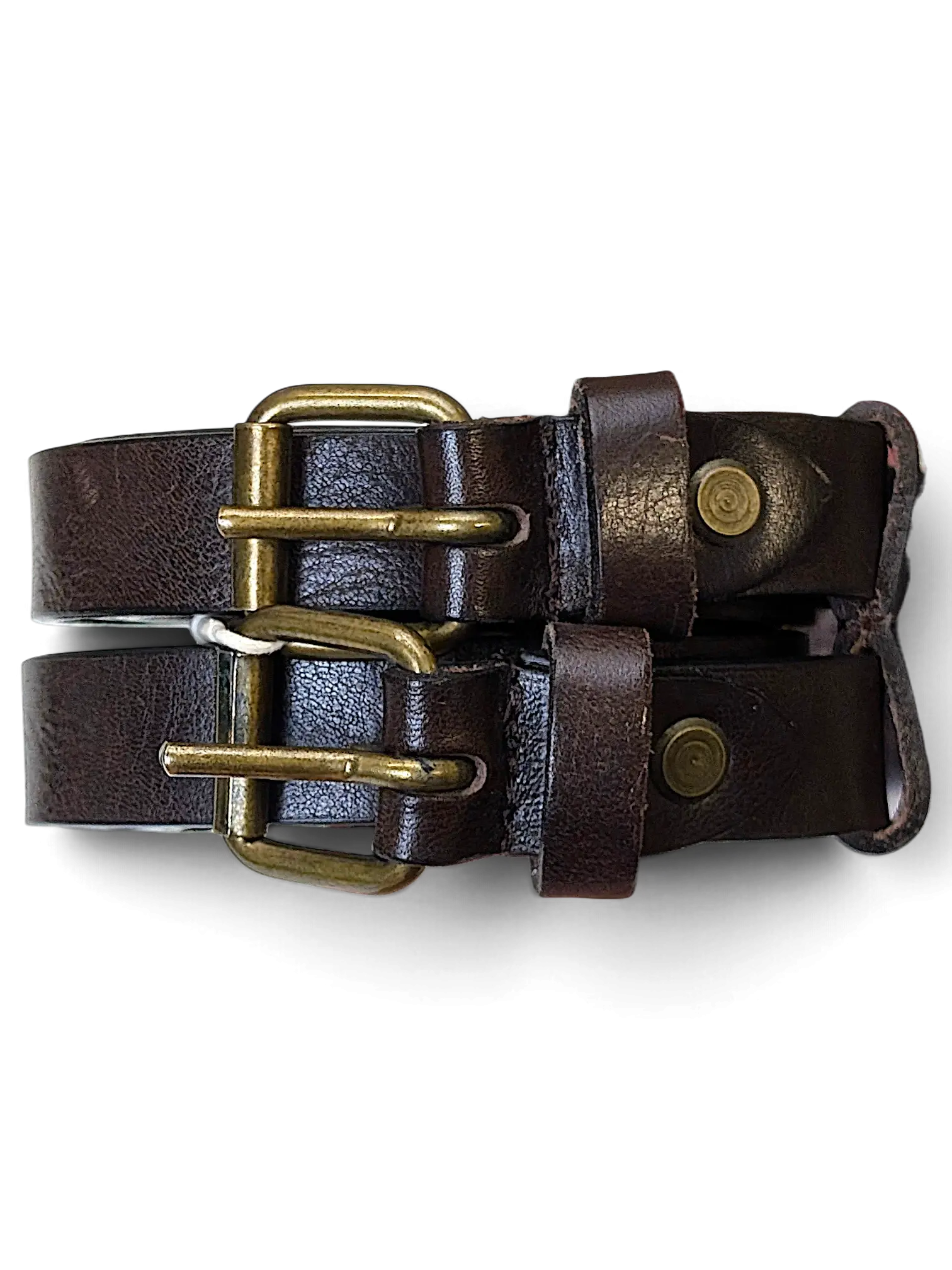 JAKE & IPI Vittozzi double dark brown leather belt with antique brass buckles held in a hand