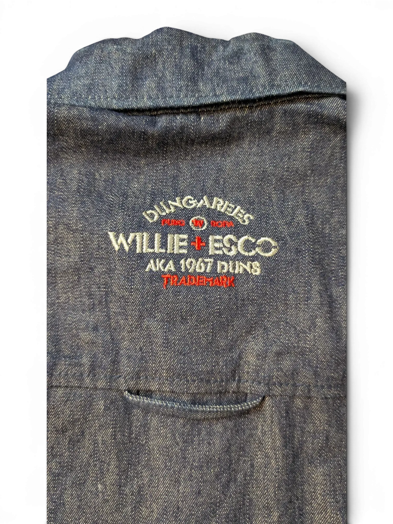 JAKE & IPI Willie Esco denim jacket with embroidered logo and pocket detail.