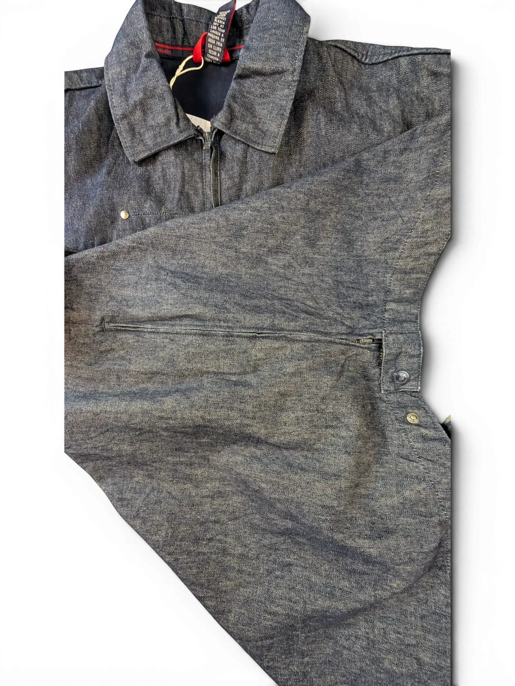 JAKE & IPI Willie Esco denim jacket in a medium blue wash with a zip-up front and button details.