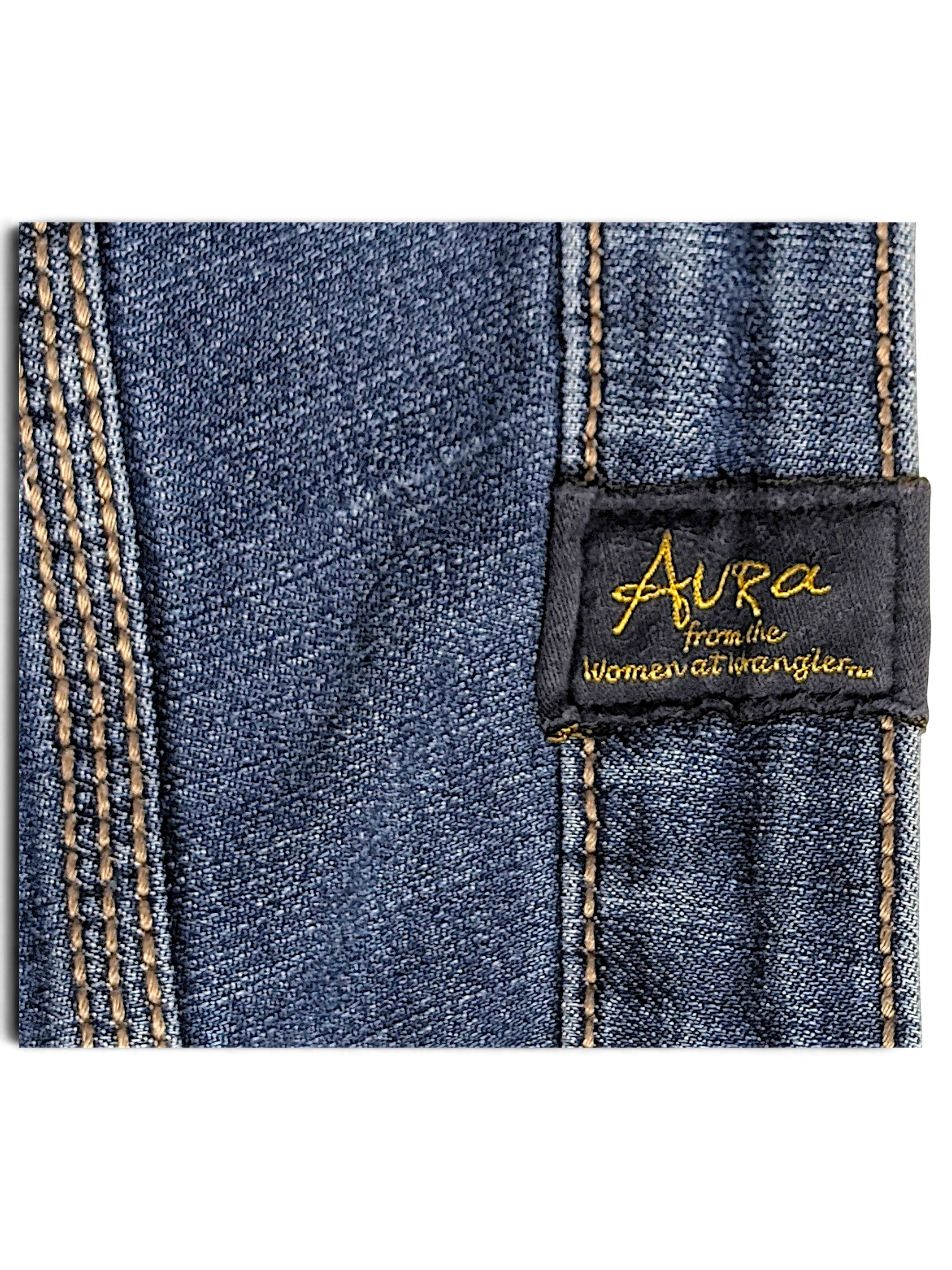 JAKE & IPI Wrangler Aura mid blue denim jeans featuring gold embroidered branding label and contrast stitching