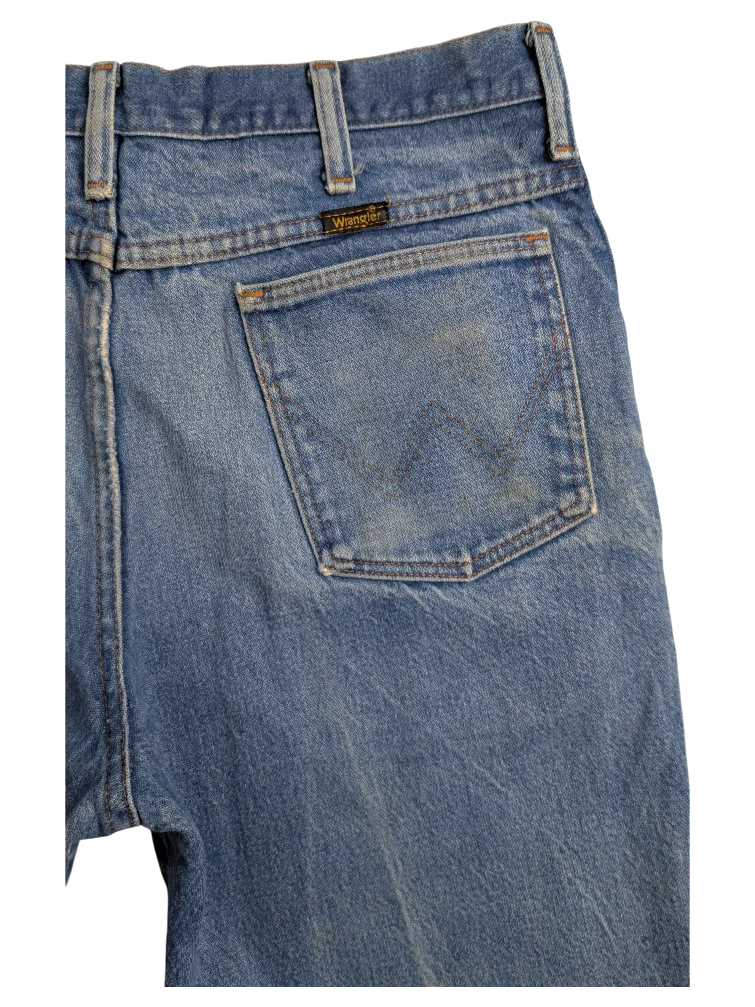 JAKE & IPI Wrangler blue denim bootcut jeans featuring a classic back pocket with signature W stitching