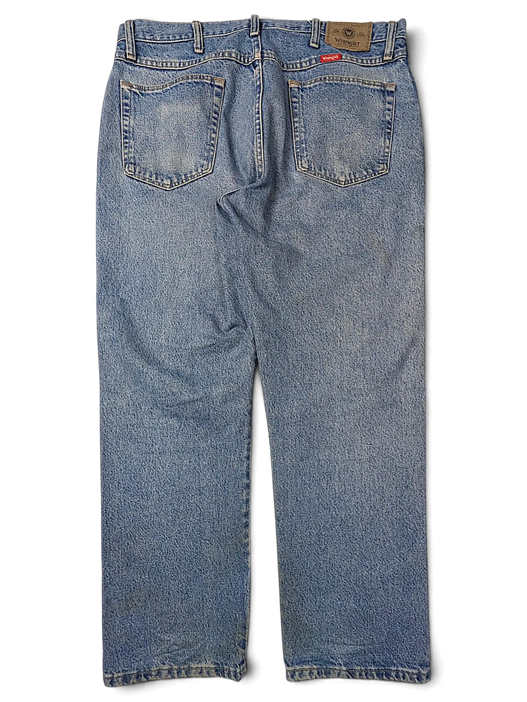 JAKE & IPI Wrangler 96501DS blue denim jeans, back view showing pockets and leather patch.