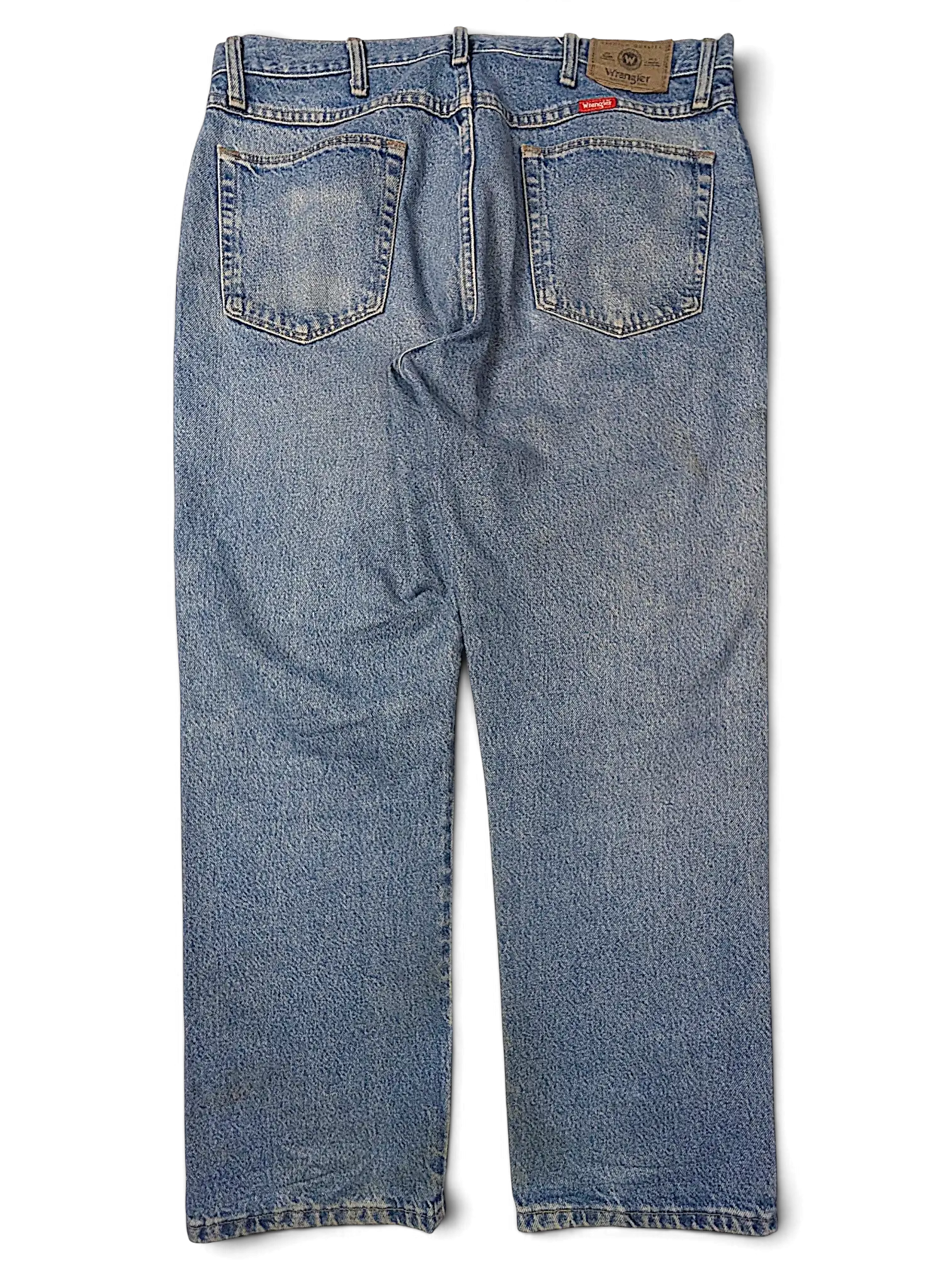 JAKE & IPI Wrangler 96501DS blue denim jeans, back view showing pockets and leather patch.