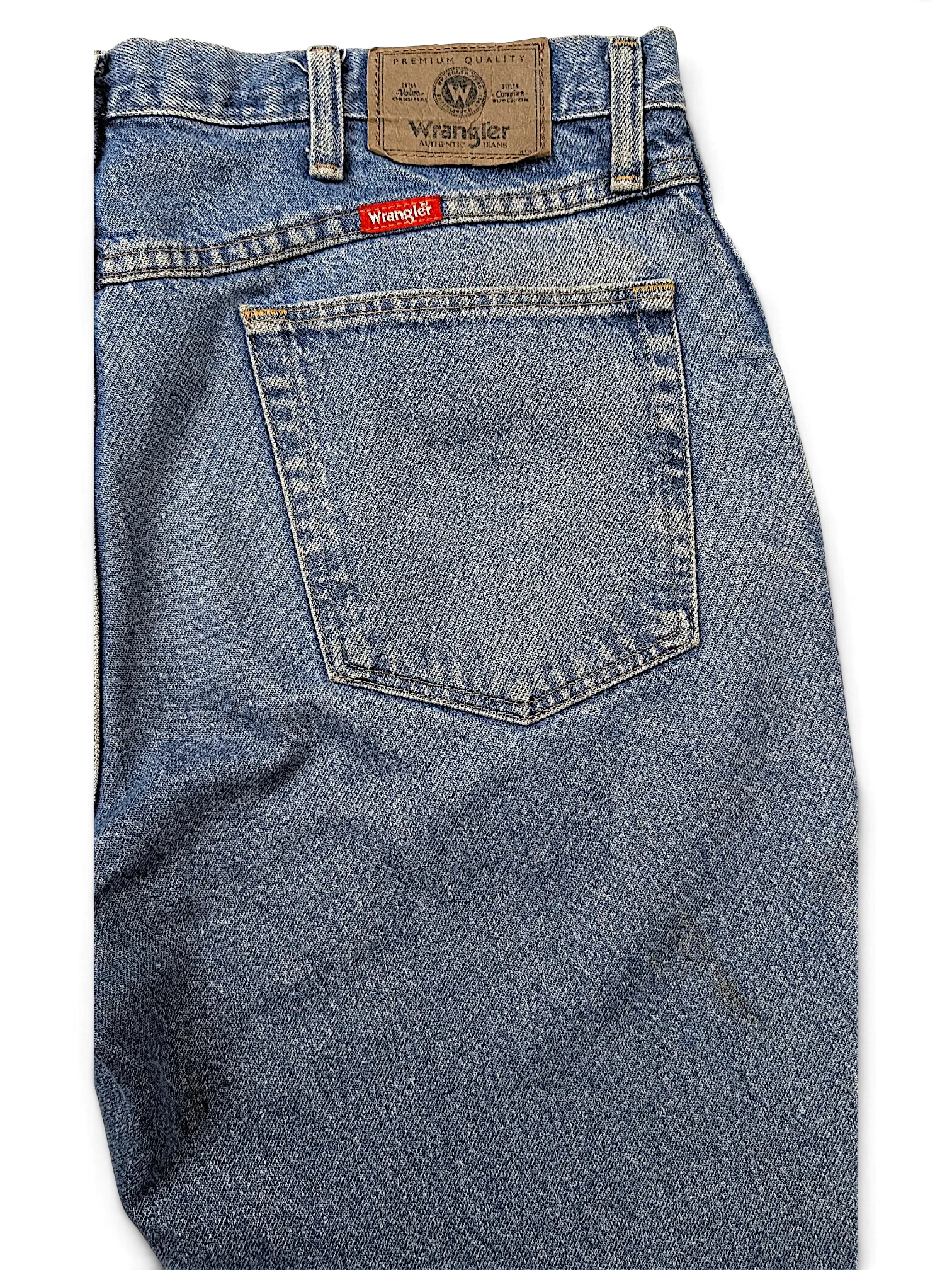 JAKE & IPI Wrangler 96501DS blue denim jeans featuring a leather back patch and classic red logo tab