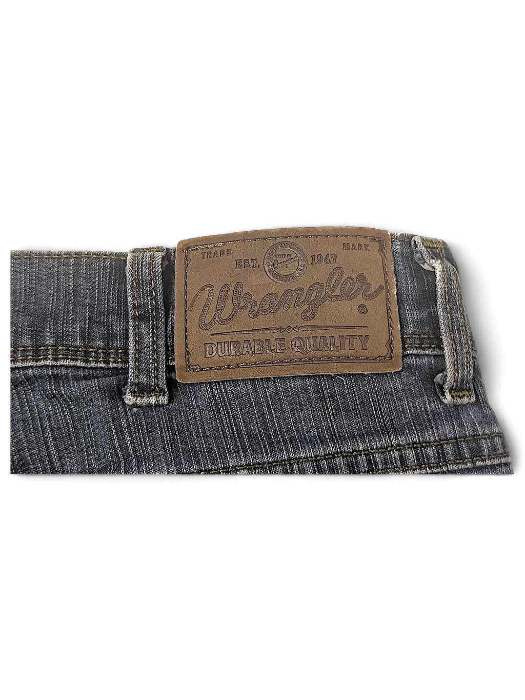 JAKE & IPI Wrangler blue denim jeans featuring a brown leather brand patch on the back waistband