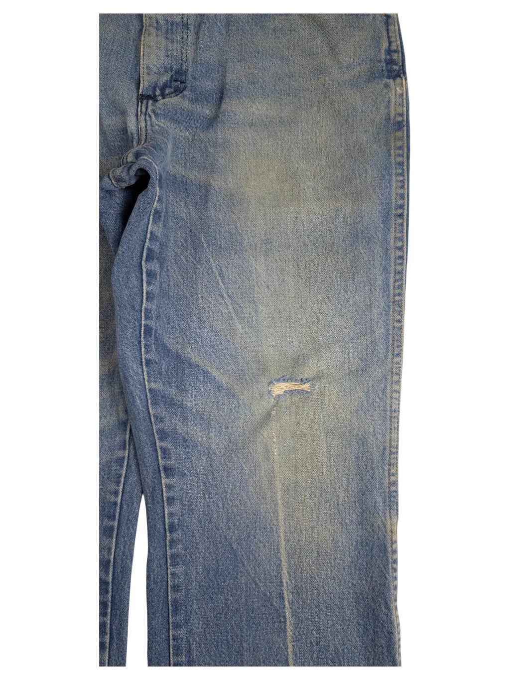 JAKE & IPI vintage light wash Wrangler bootcut jeans with a distressed knee detail on a black background.
