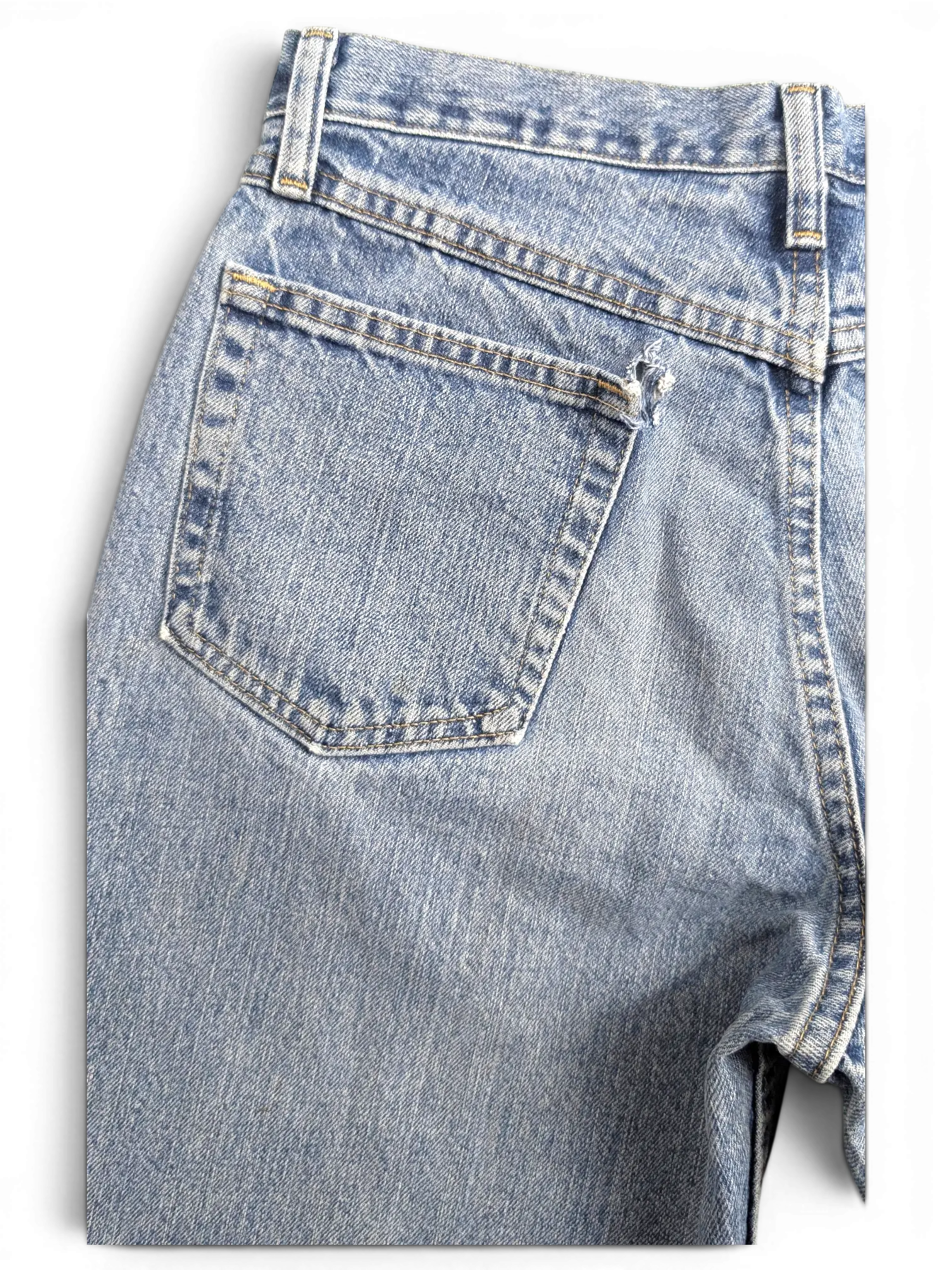 JAKE & IPI vintage Wrangler jeans in light blue denim with a distressed back pocket detail