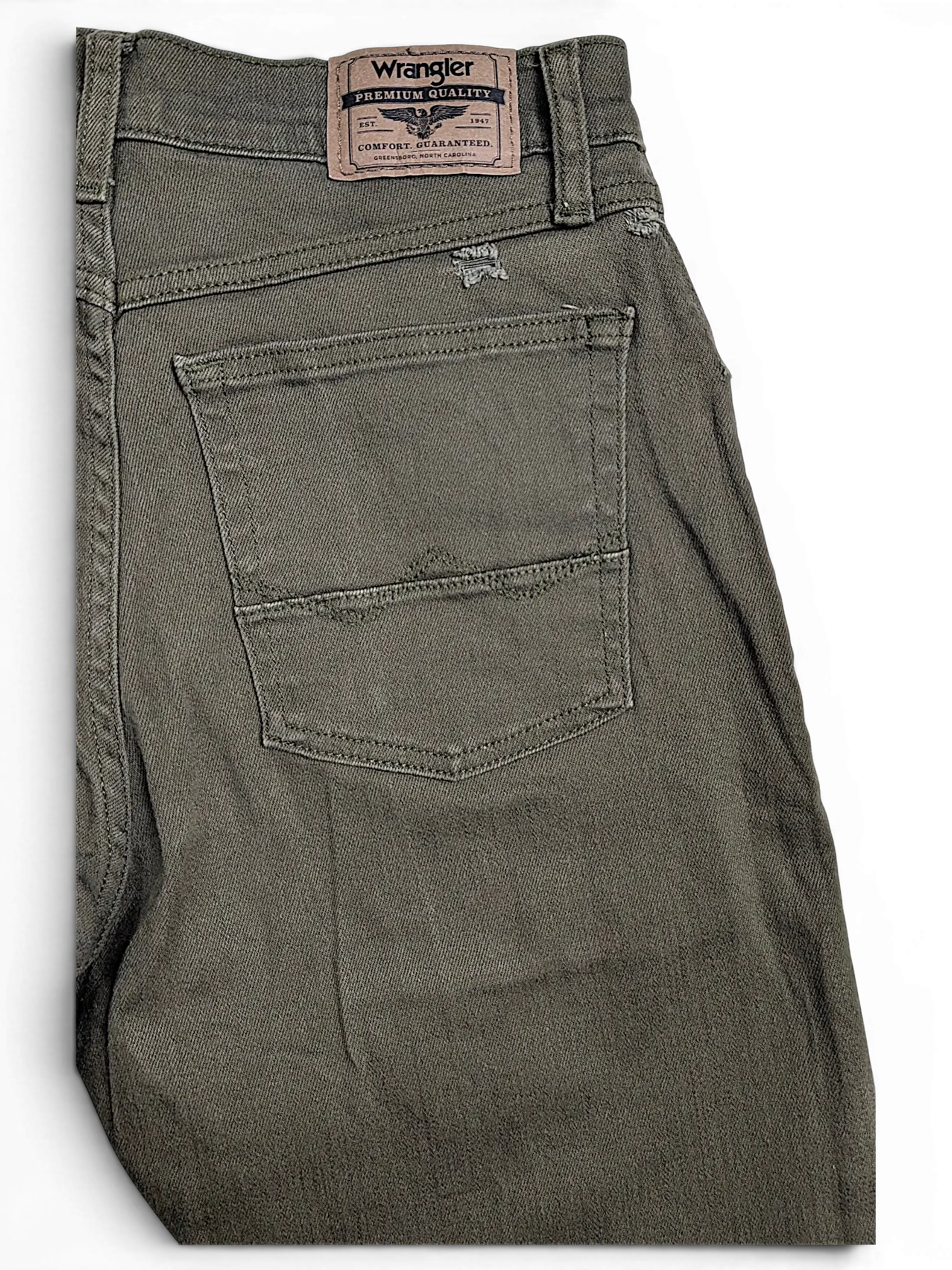 JAKE & IPI Wrangler green athletic fit jeans featuring a back pocket and branded leather patch